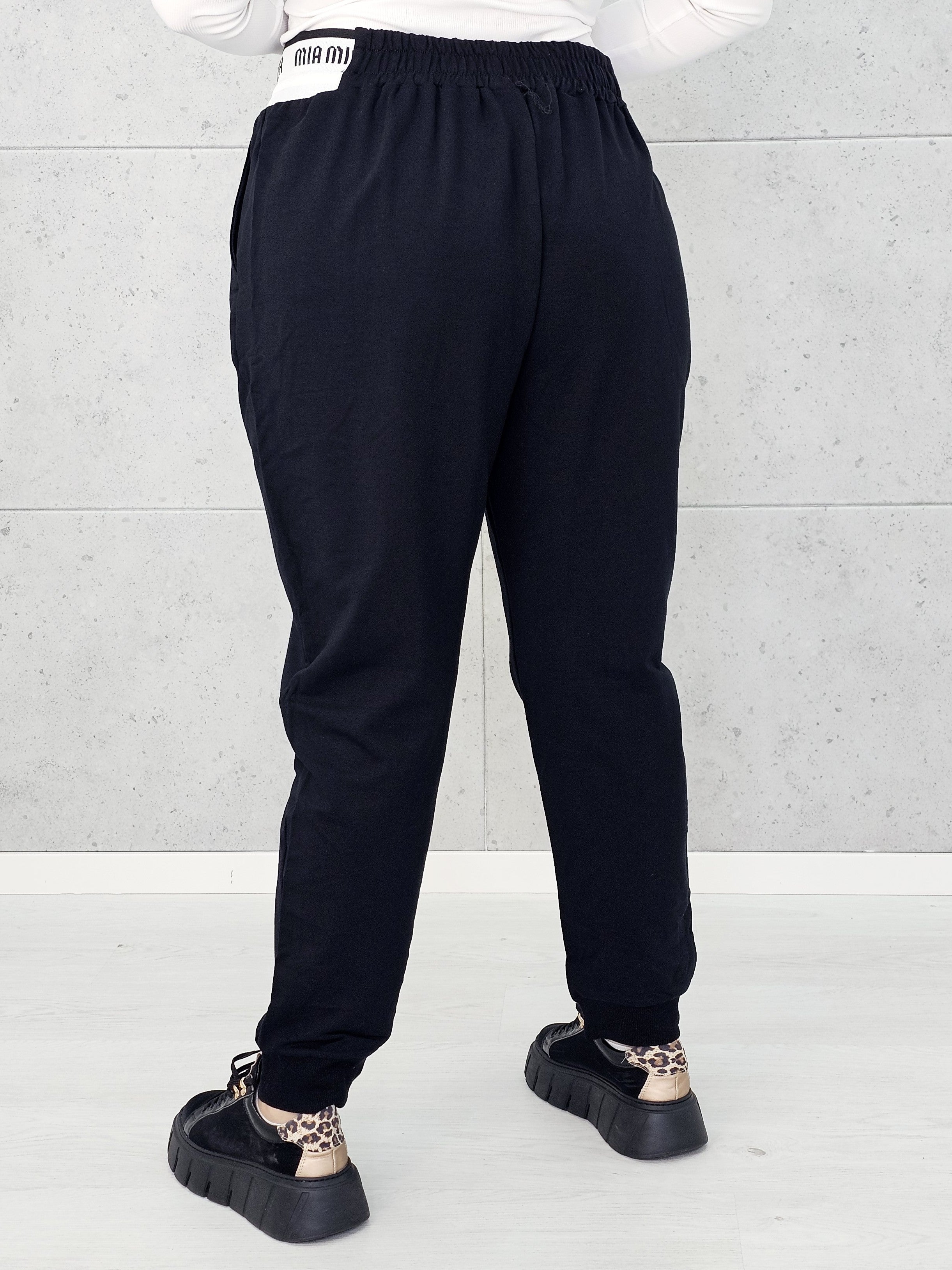 Sportowe spodnie z logowaną gumką Stylowa XL