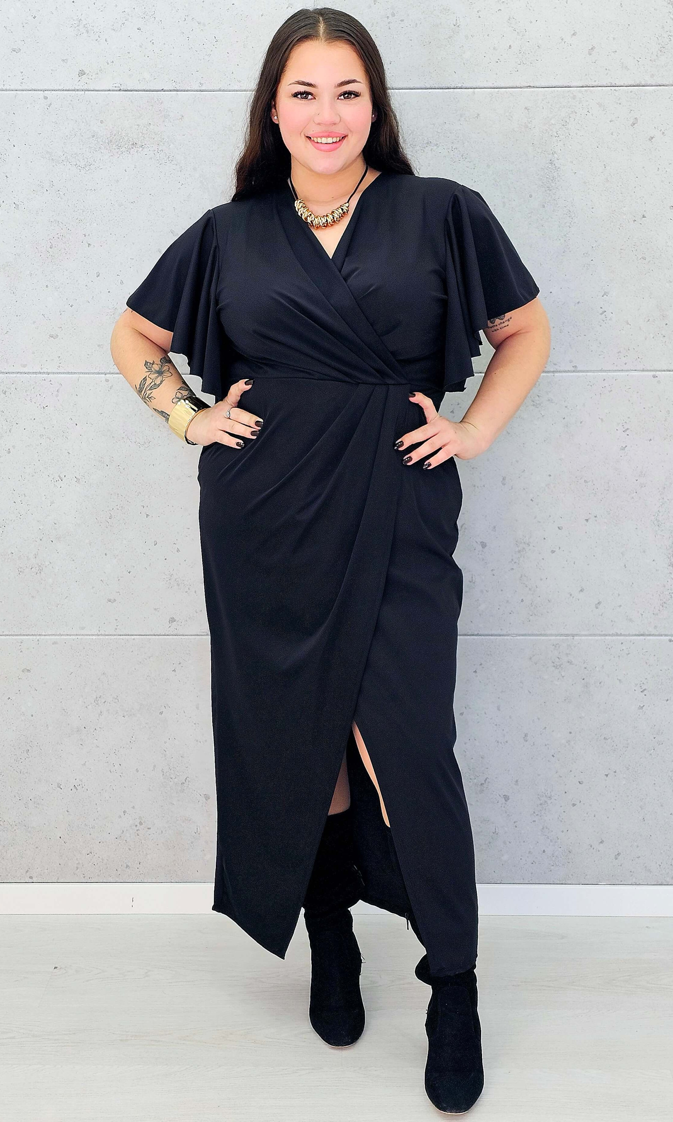 Sukienka plus size z kopertowym dekoltem – elegancja i wygoda w nowoczesnym wydaniu Stylowa XL