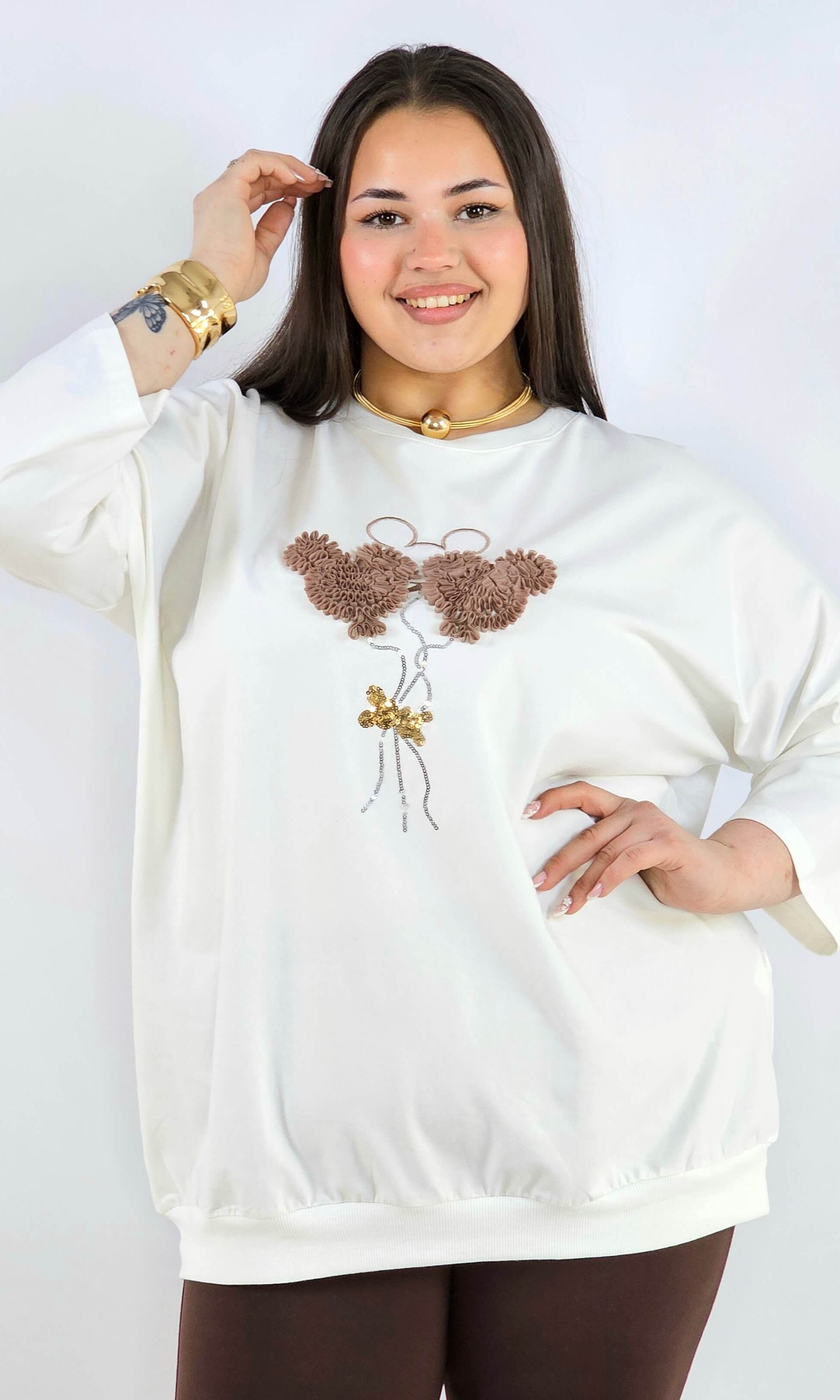 Bluza plus size z ozdobną aplikacją XXL – styl i wygoda Stylowa XL