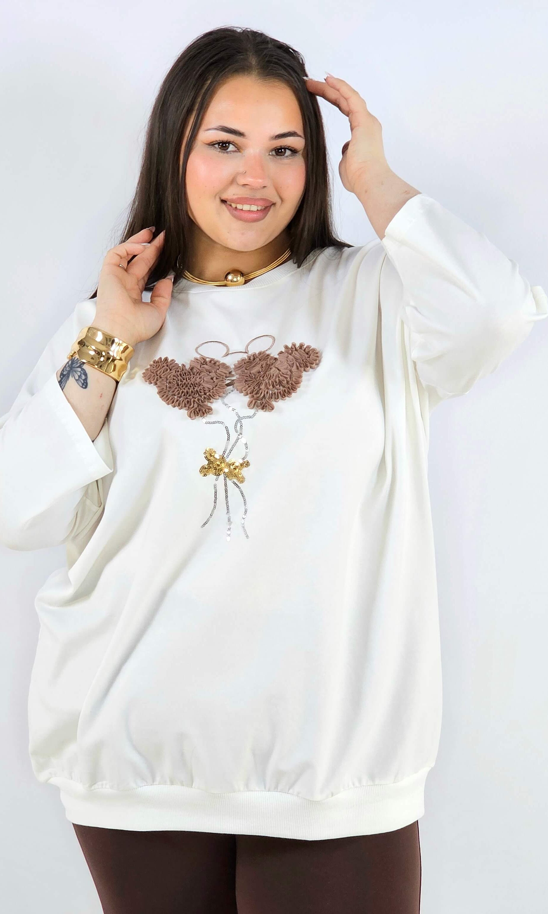 Bluza plus size z ozdobną aplikacją XXL – styl i wygoda Stylowa XL