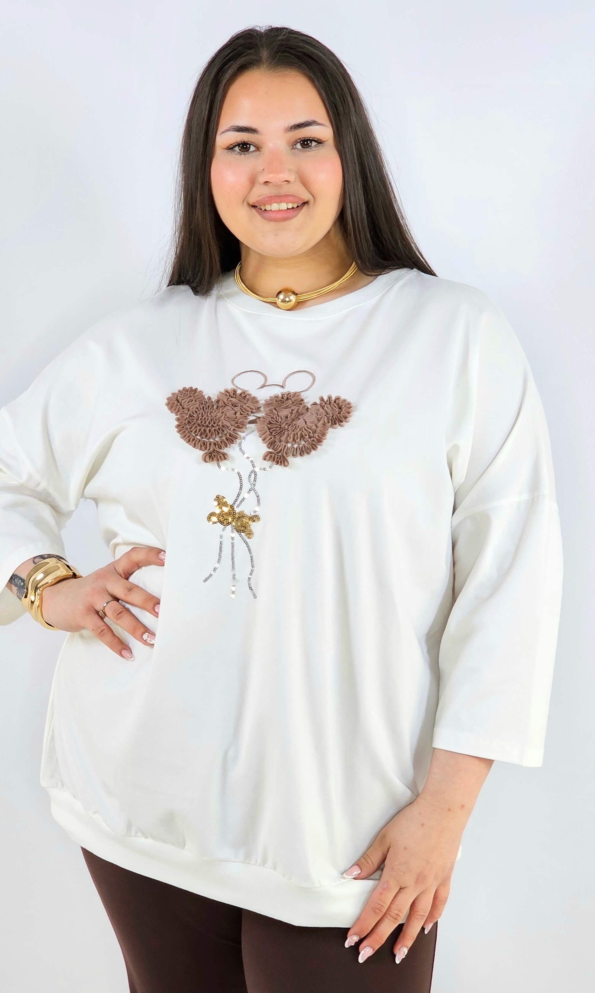 Bluza plus size z ozdobną aplikacją XXL – styl i wygoda Stylowa XL