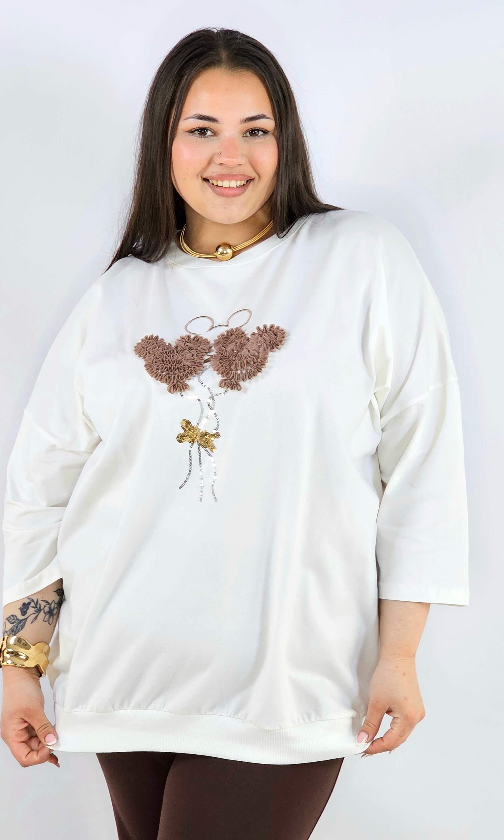 Bluza plus size z ozdobną aplikacją XXL – styl i wygoda Stylowa XL