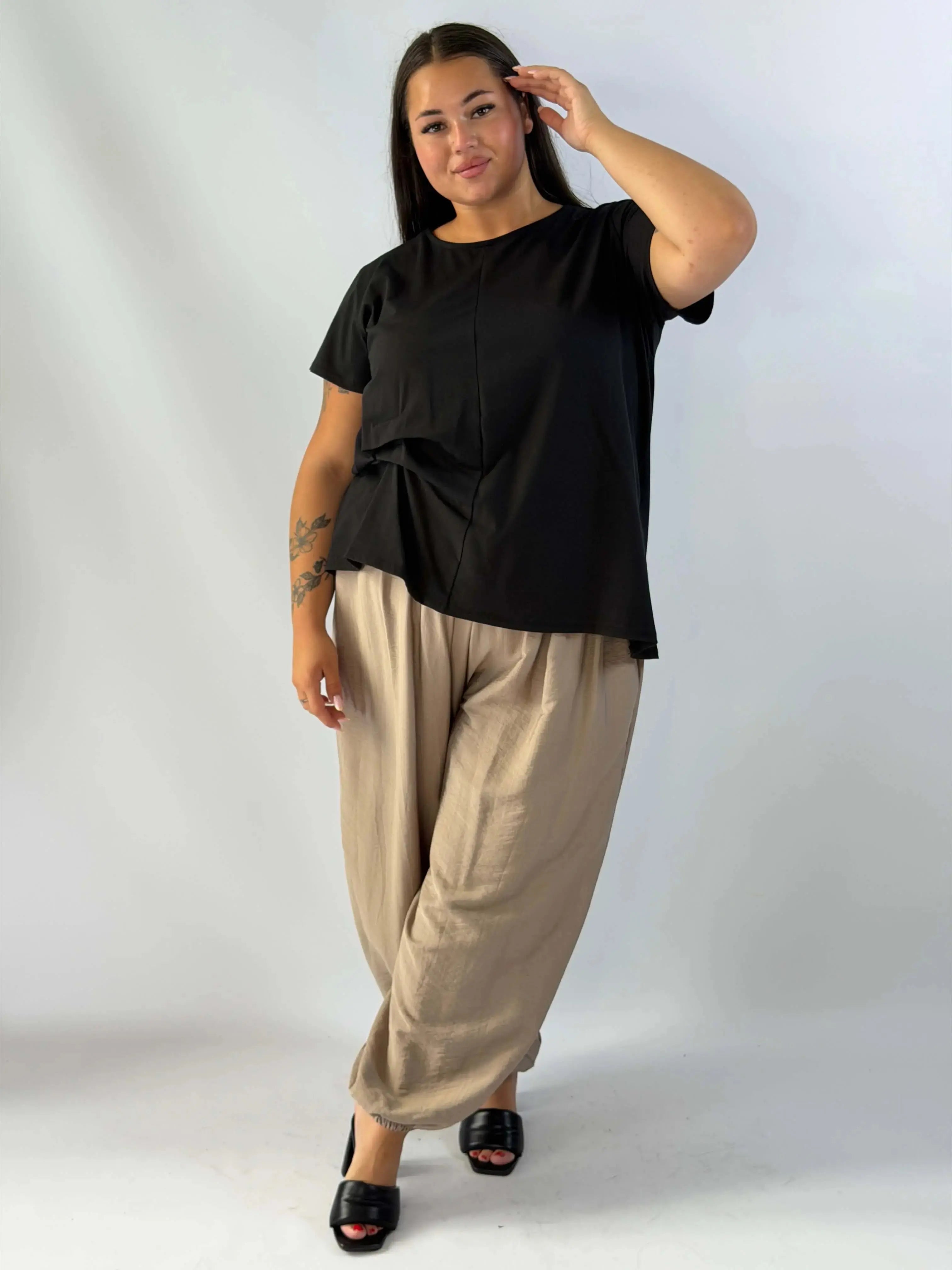 Bluzka Plus Size z efektownym wiązaniem – wygodna i kobieca Stylowa XL