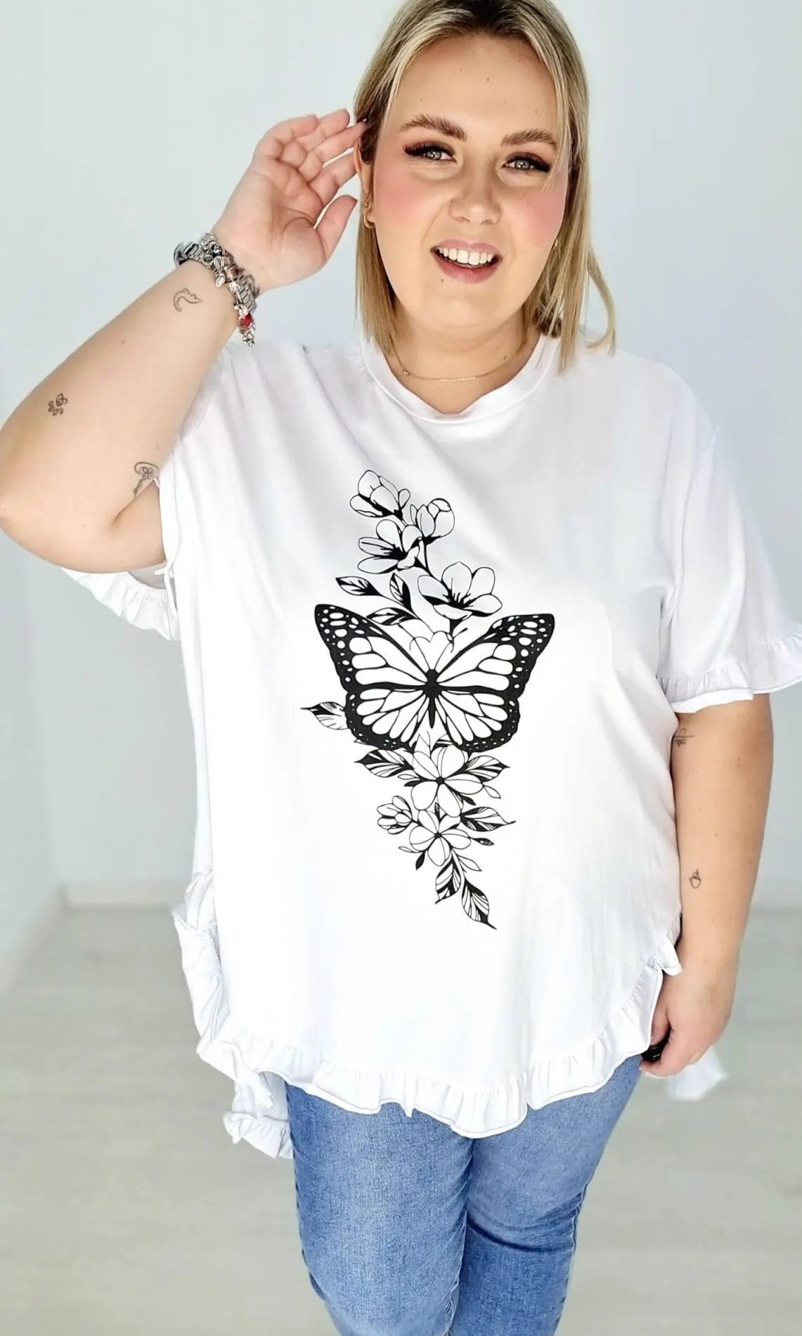 Bluzka bawełniana, rękaw oraz dół bluzki zakończony falbanką. Stylowa XL