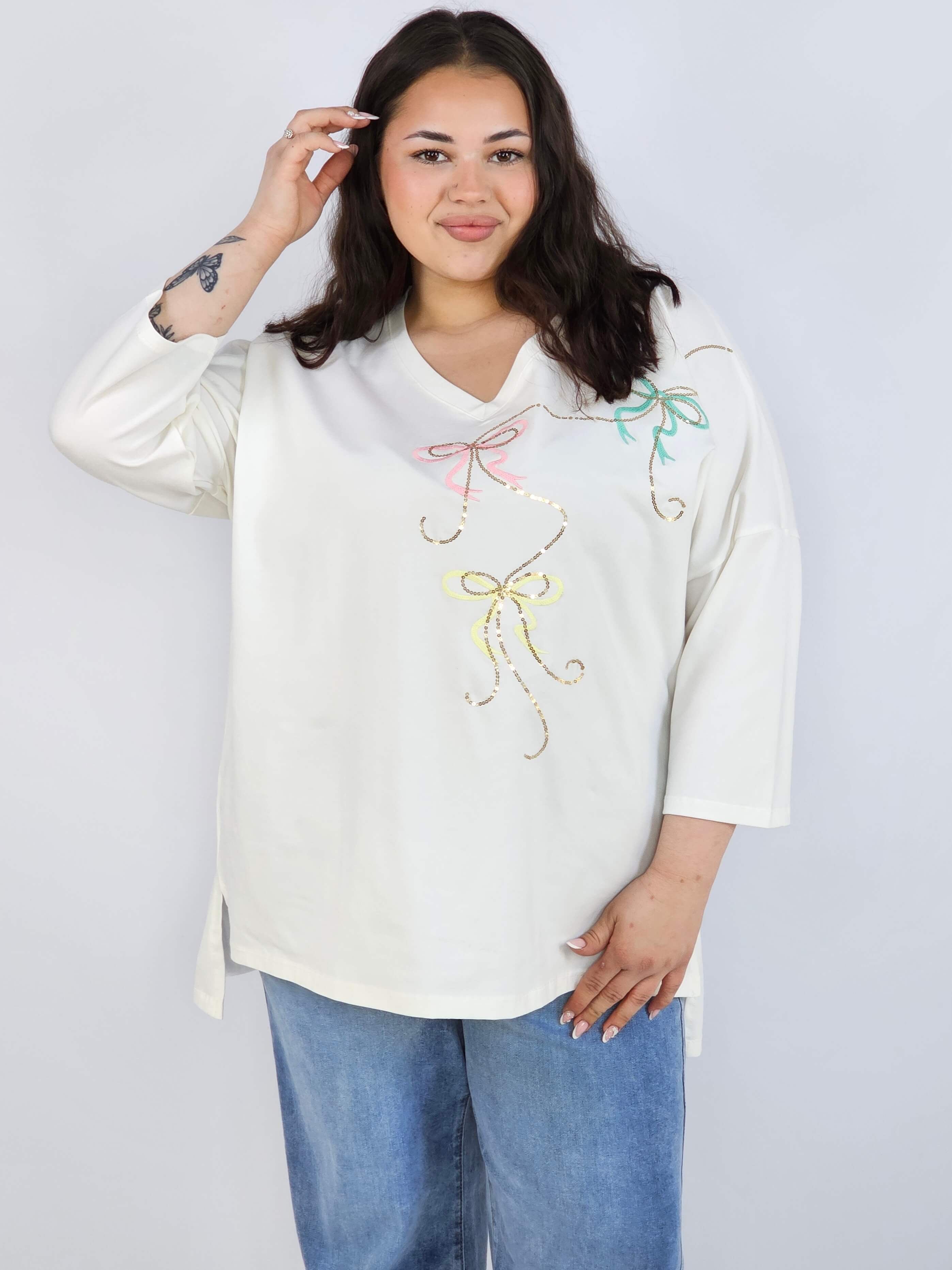 Bluzka plus size XXL z efektownym zdobieniem – lekkość i styl na każdą okazję Stylowa XL