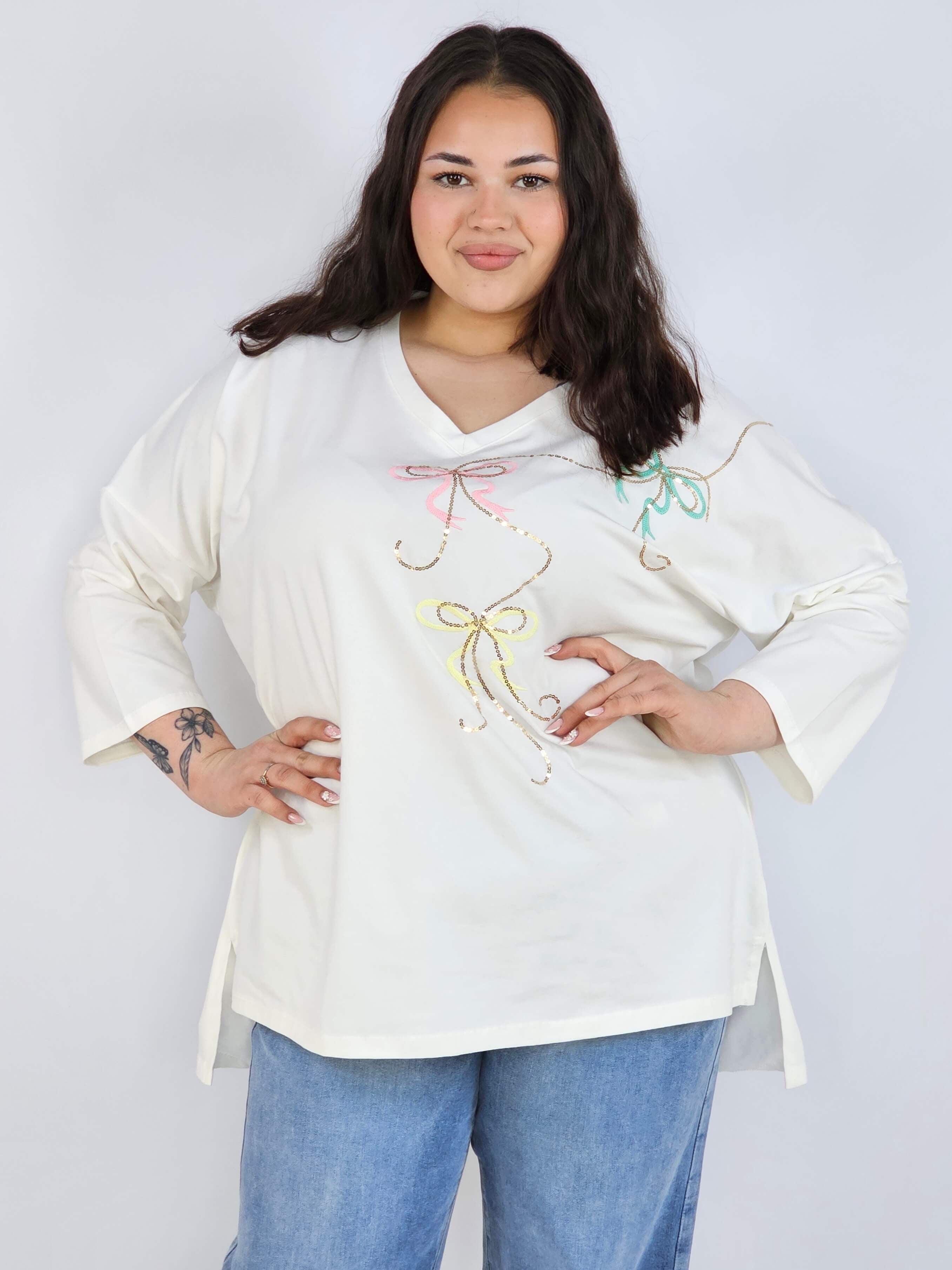 Bluzka plus size XXL z efektownym zdobieniem – lekkość i styl na każdą okazję Stylowa XL