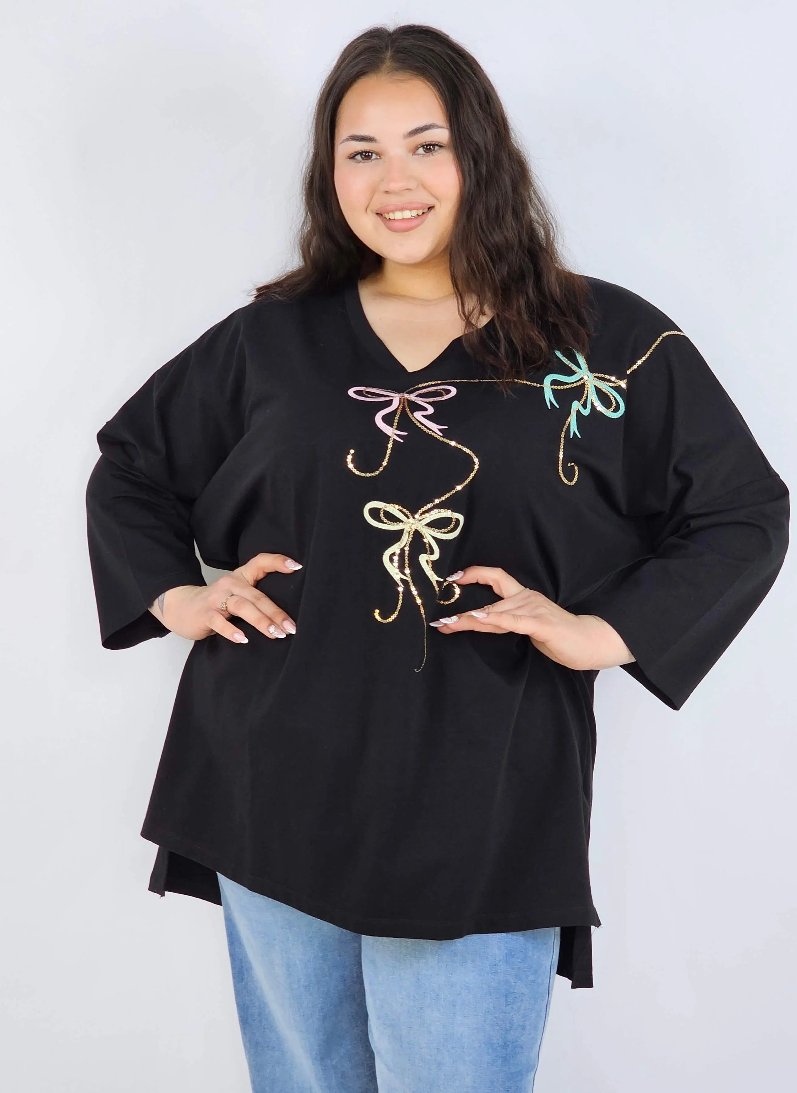 Bluzka plus size XXL z efektownym zdobieniem – lekkość i styl na każdą okazję Stylowa XL