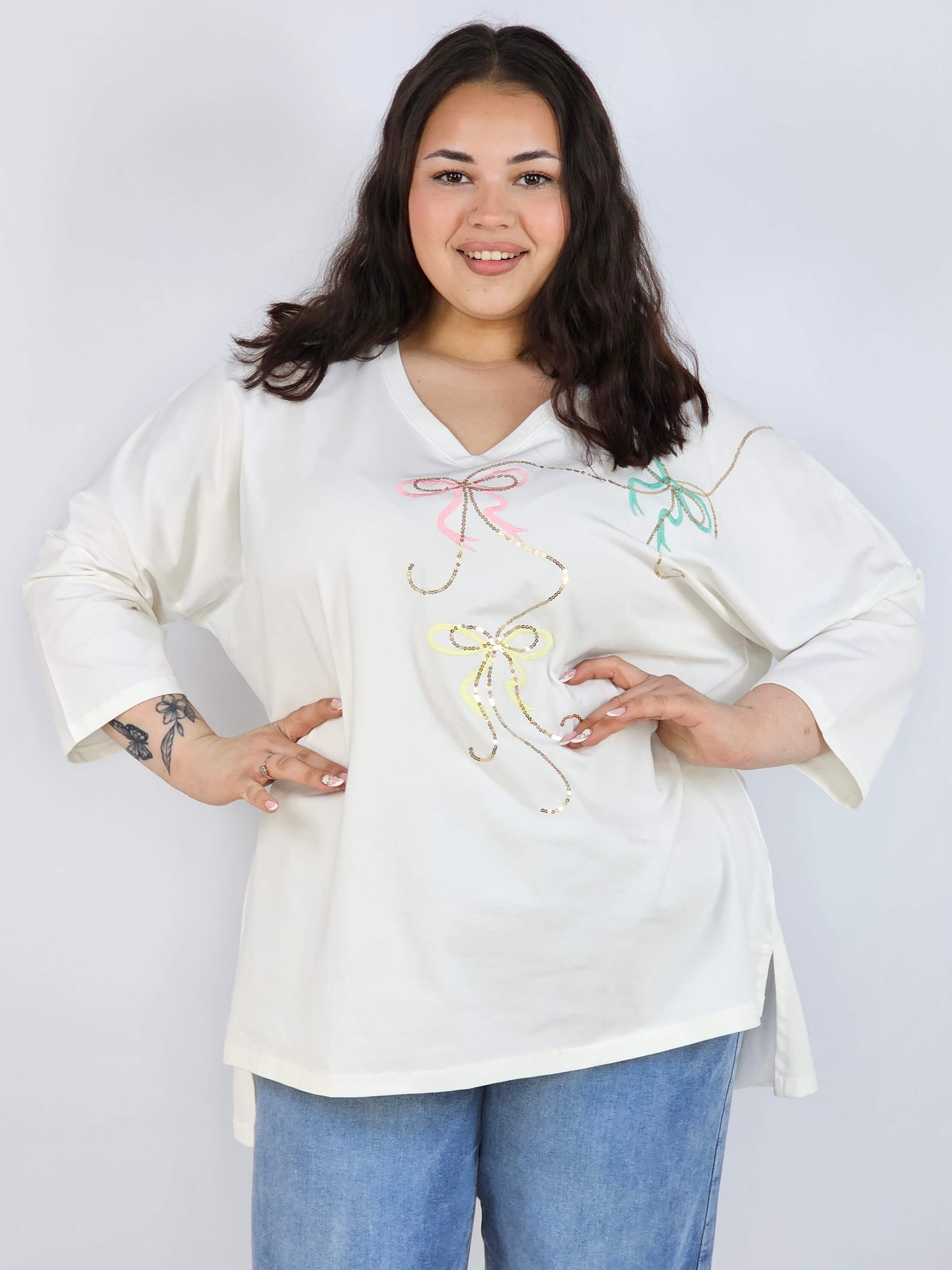 Bluzka plus size XXL z efektownym zdobieniem – lekkość i styl na każdą okazję Stylowa XL