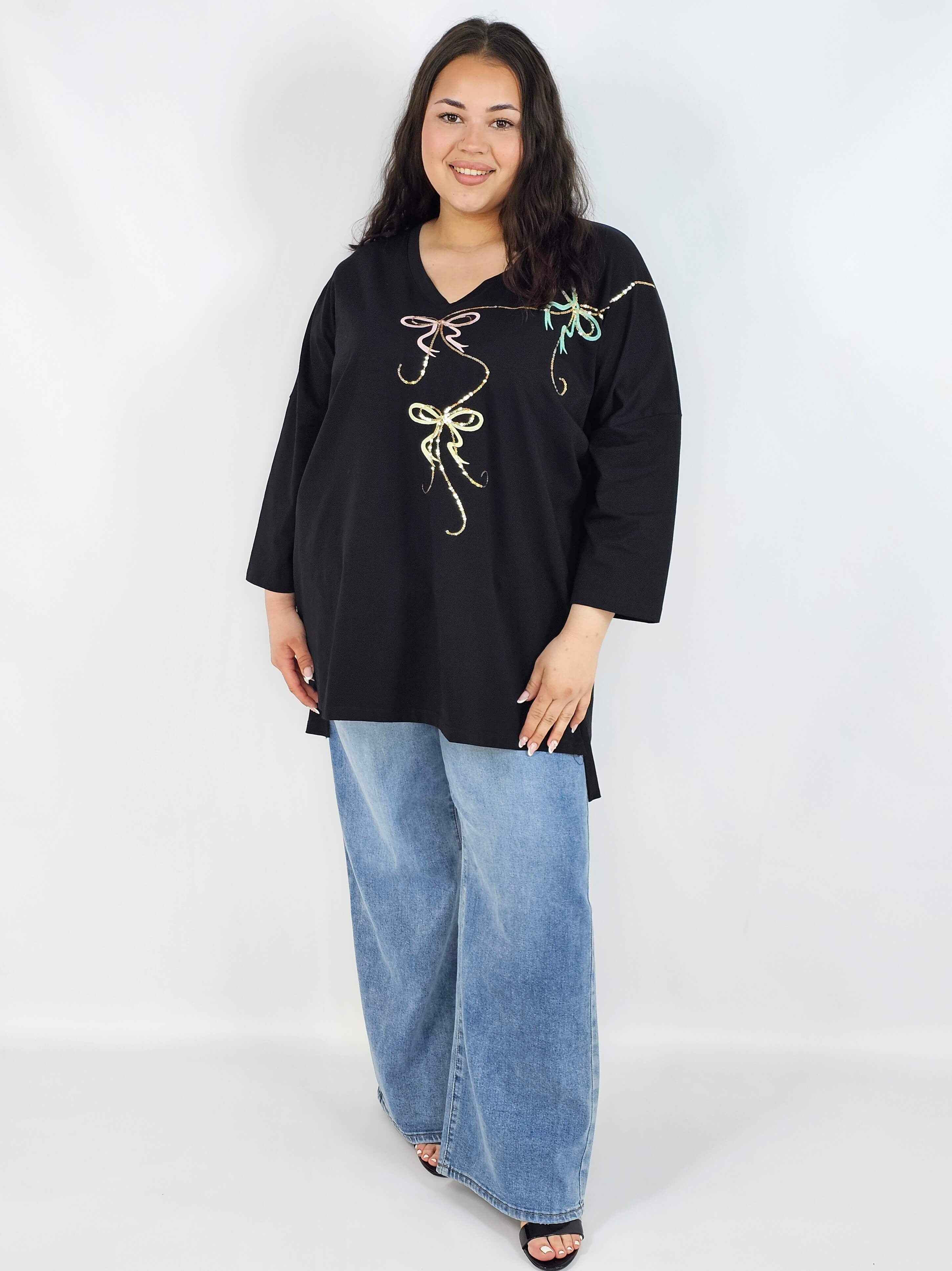 Bluzka plus size XXL z efektownym zdobieniem – lekkość i styl na każdą okazję Stylowa XL