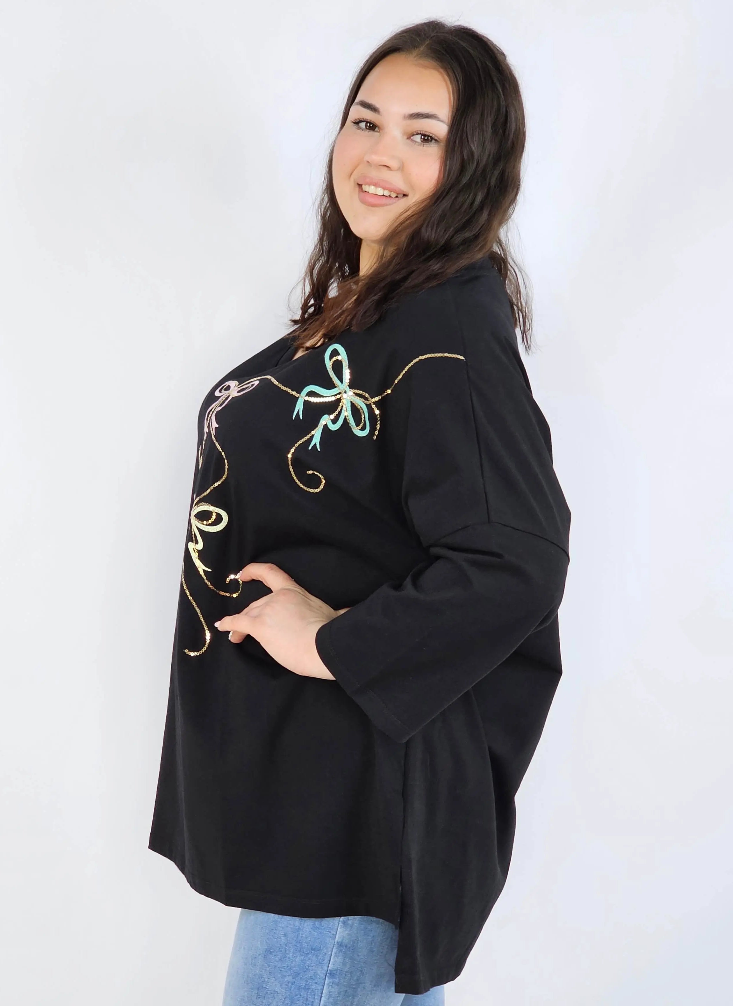 Bluzka plus size XXL z efektownym zdobieniem – lekkość i styl na każdą okazję Stylowa XL
