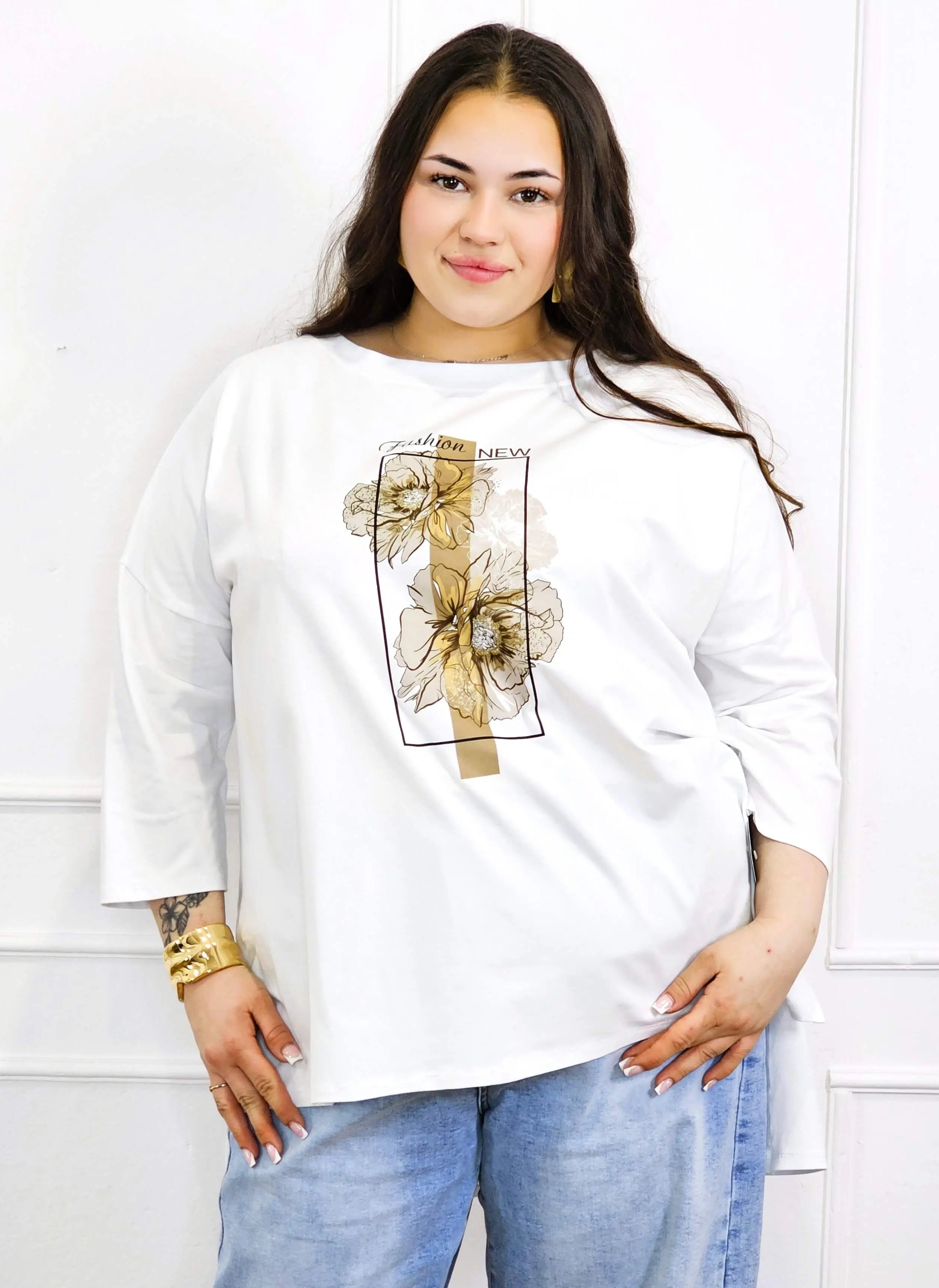 Bluzka plus size biała z kwiatowym nadrukiem i rękawem 3/4 – modny oversize Stylowa XL
