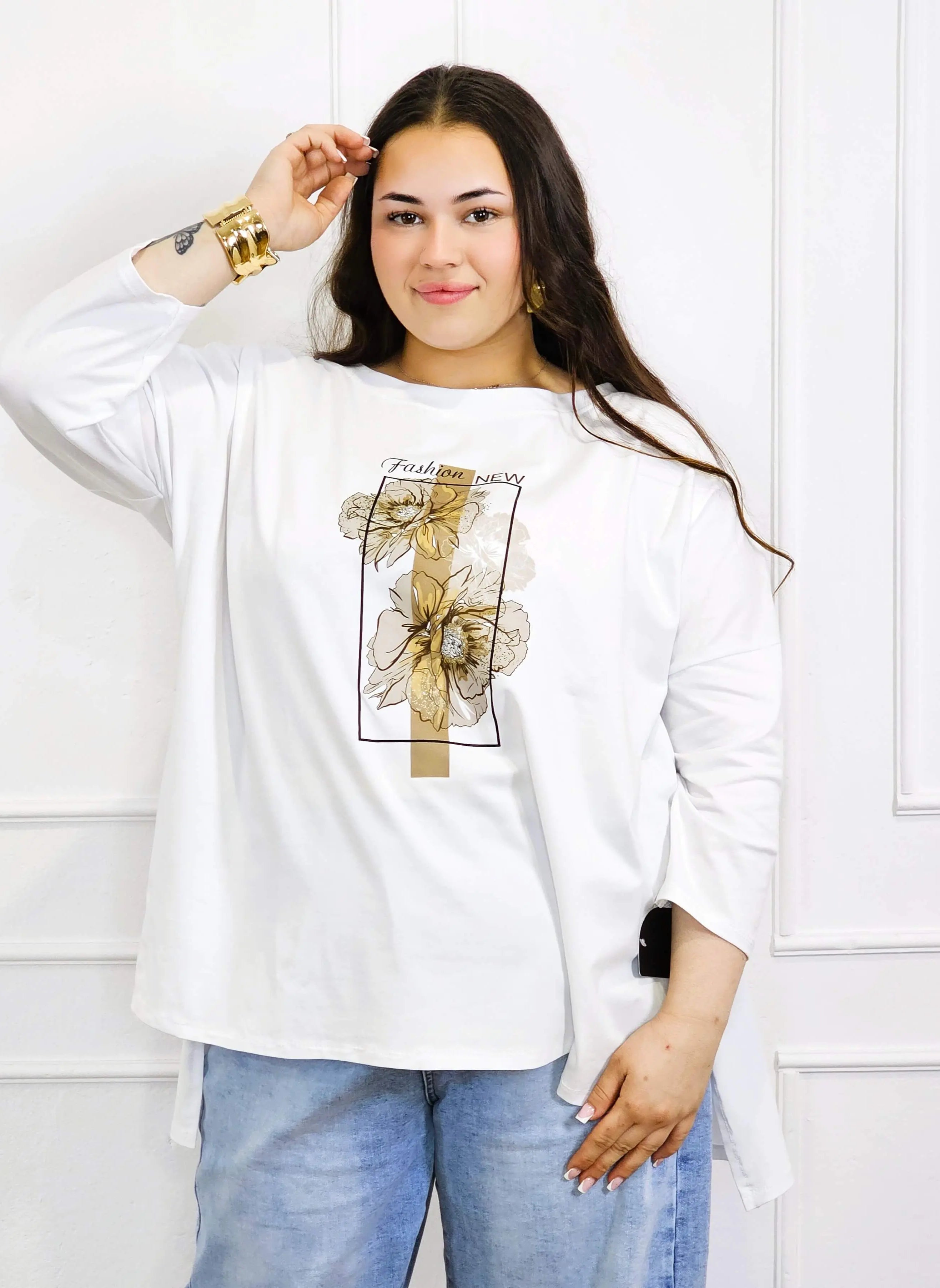 Bluzka plus size biała z kwiatowym nadrukiem i rękawem 3/4 – modny oversize Stylowa XL