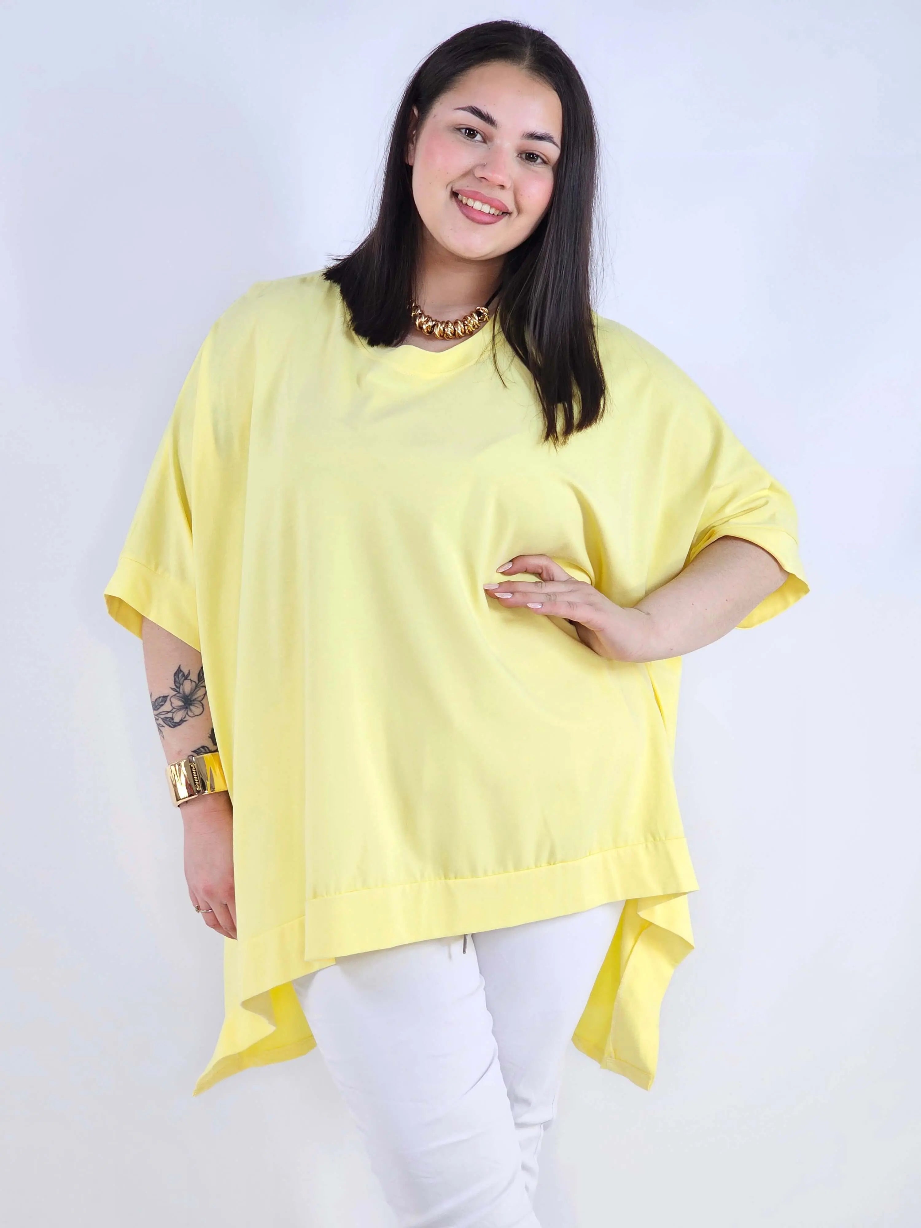 Bluzka plus size oversize z asymetrycznym dołem – wygodna bluzka damska XXL Stylowa XL