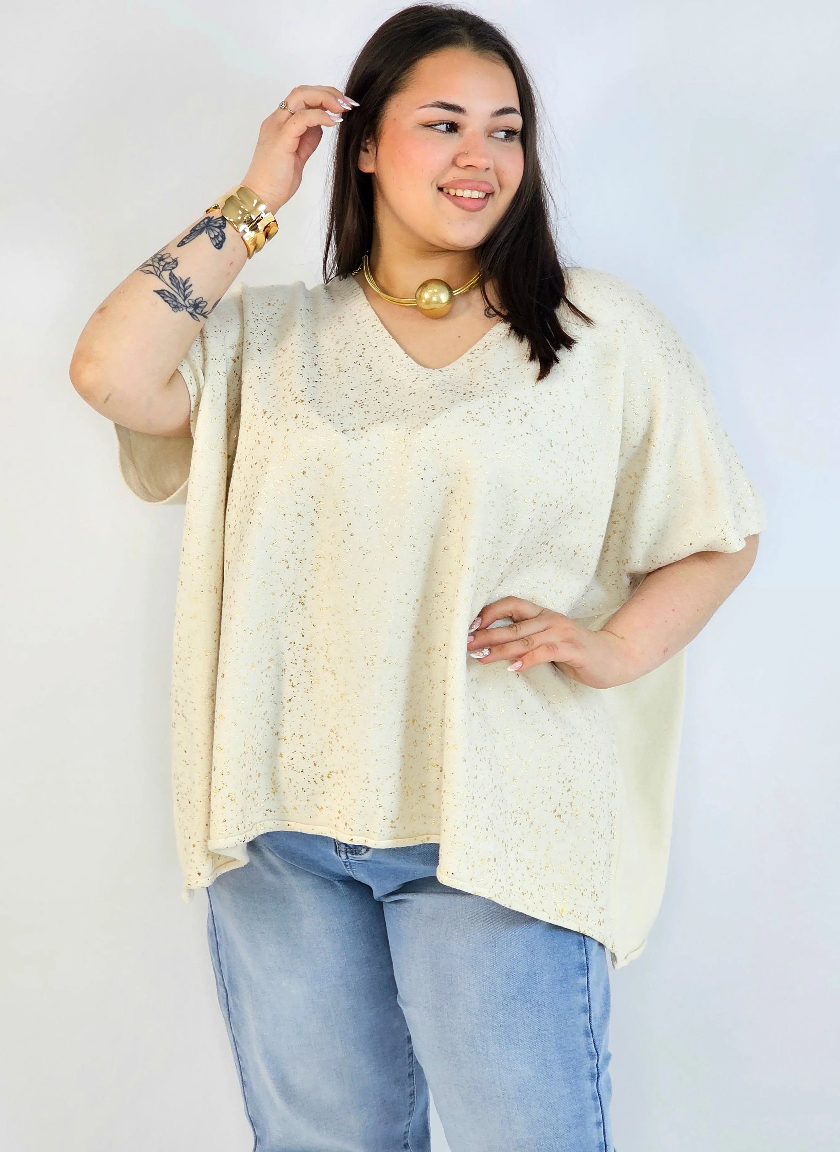 Bluzka plus size sweterkowa ze złotym zdobieniem – elegancka i lekka Stylowa XL