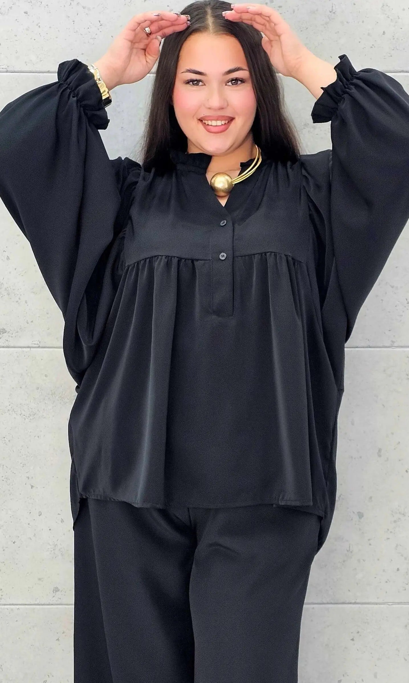 Bluzka plus size z bufiastymi rękawami. Stylowa XL