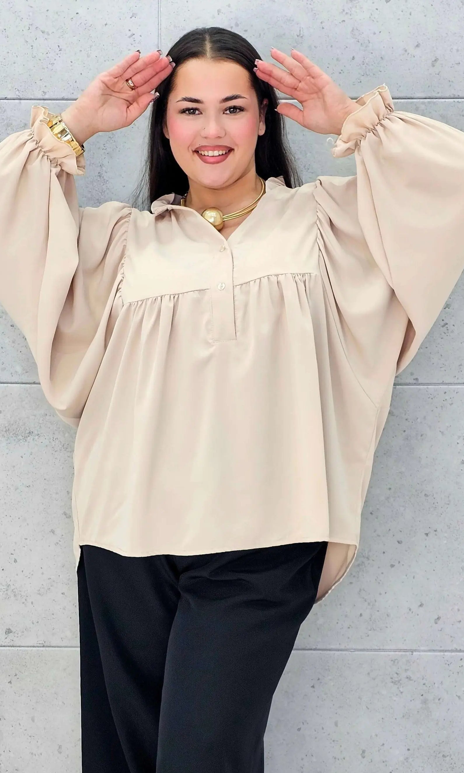 Bluzka plus size z bufiastymi rękawami. Stylowa XL