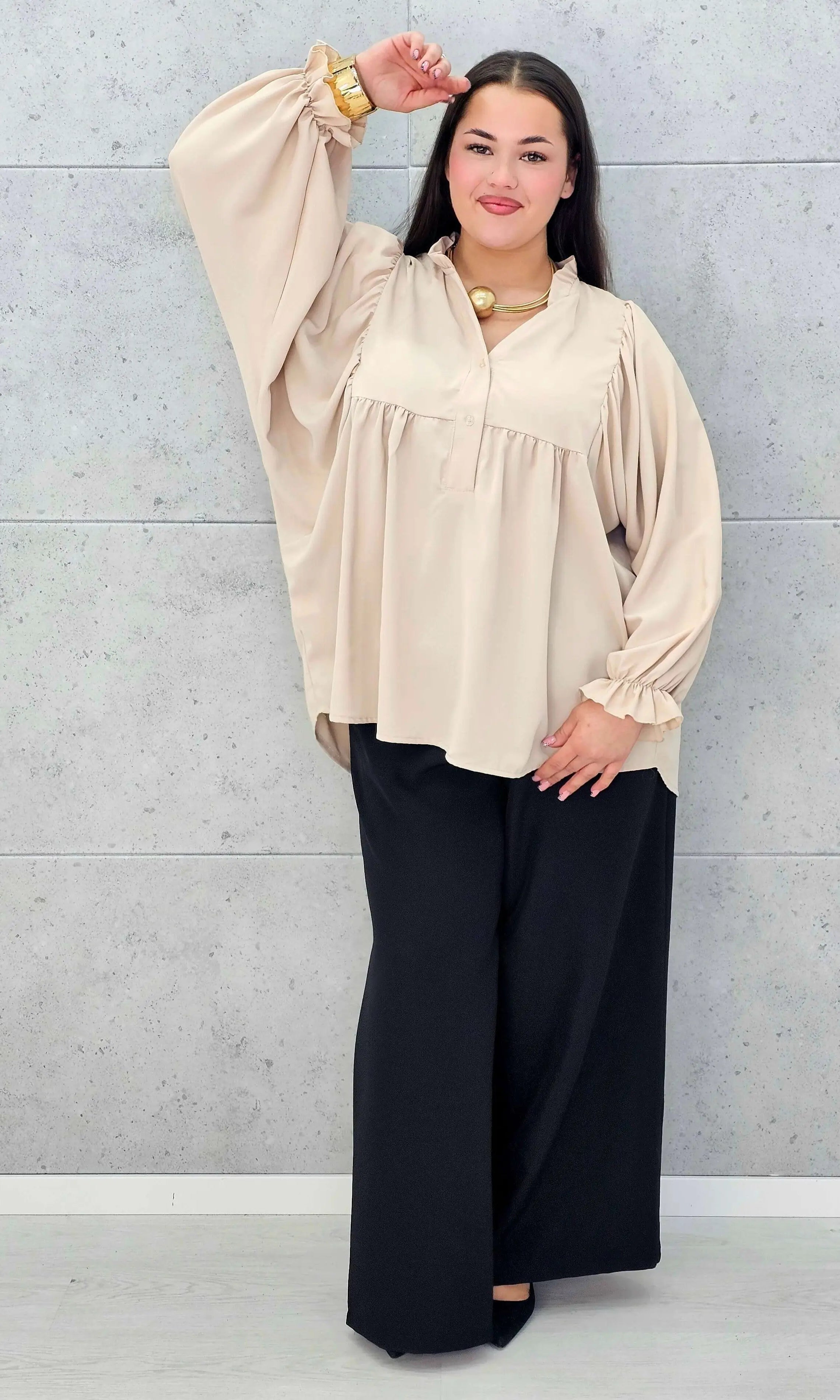 Bluzka plus size z bufiastymi rękawami. Stylowa XL