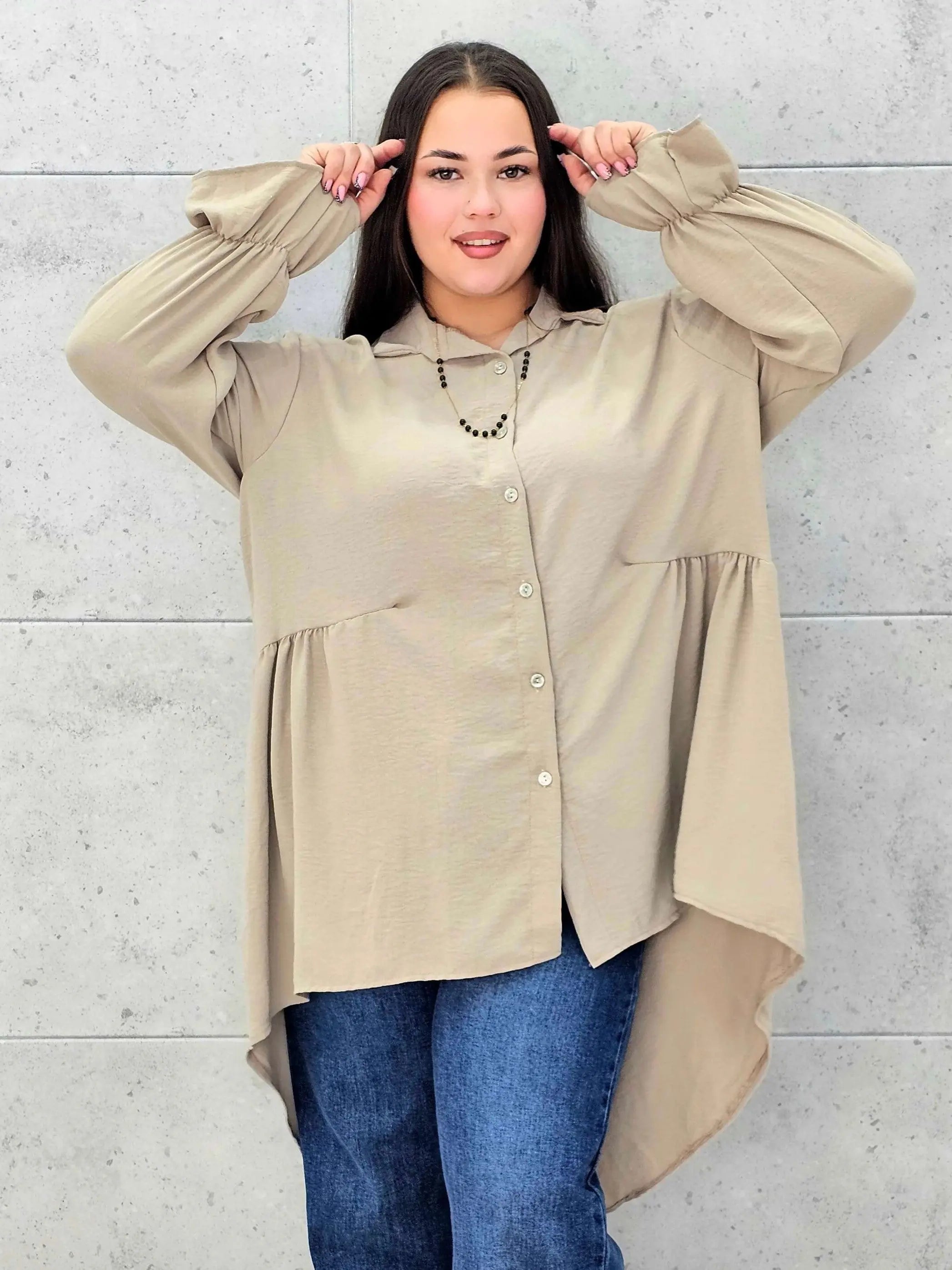 Bluzka plus size z dłuższym tyłem i eleganckim fasonem - Stylowa XL