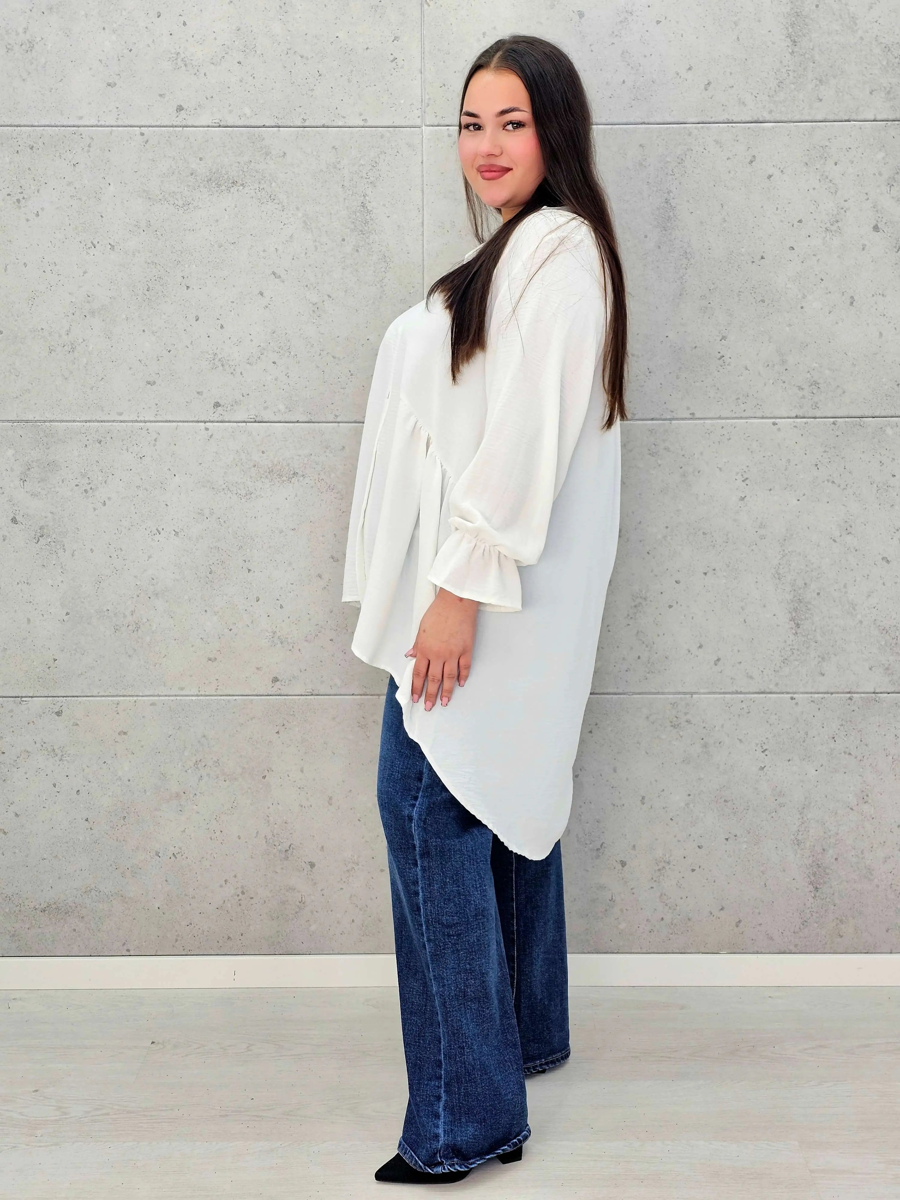 Bluzka plus size z dłuższym tyłem i eleganckim fasonem - Stylowa XL