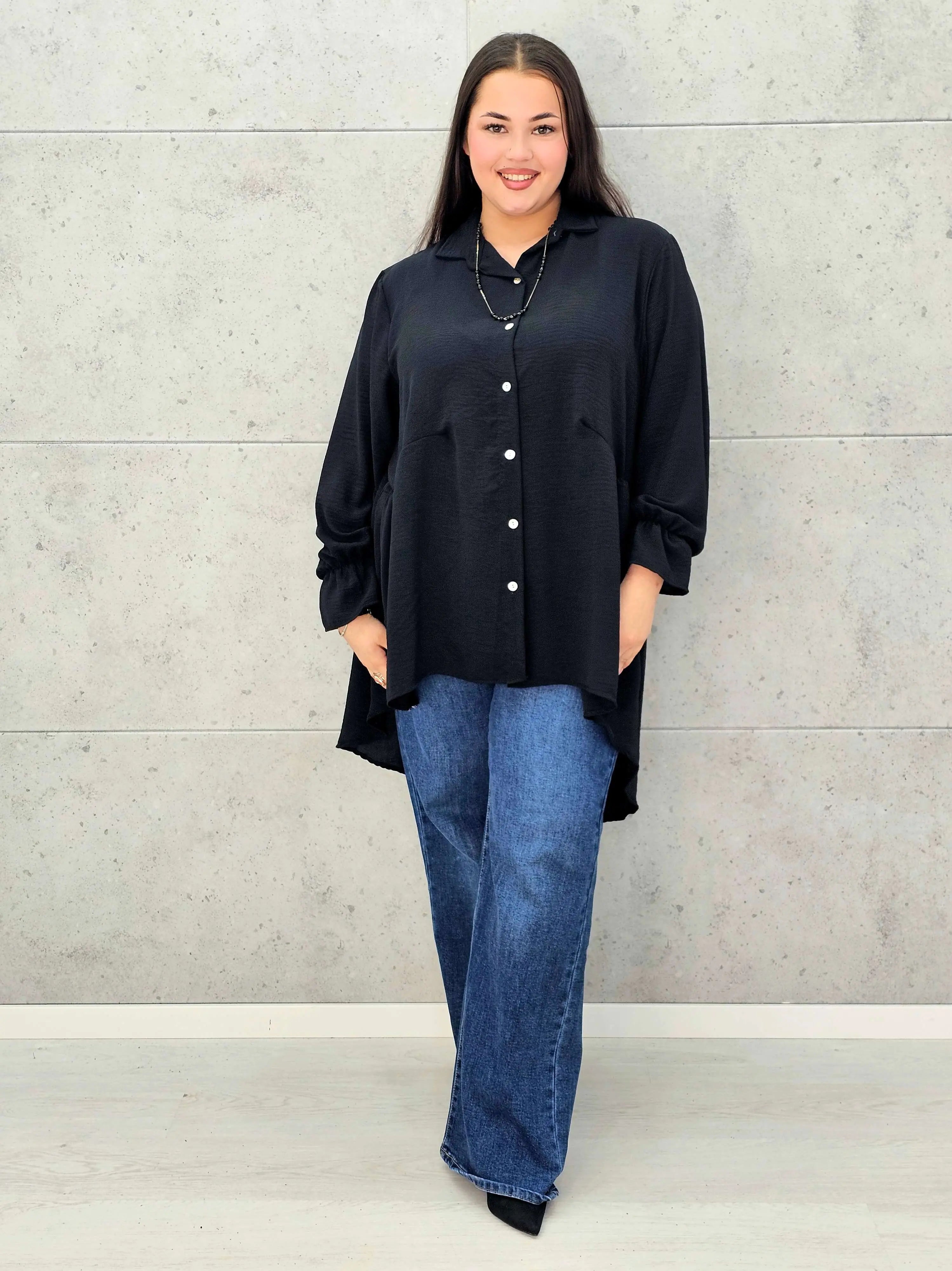 Bluzka plus size z dłuższym tyłem i eleganckim fasonem - Stylowa XL