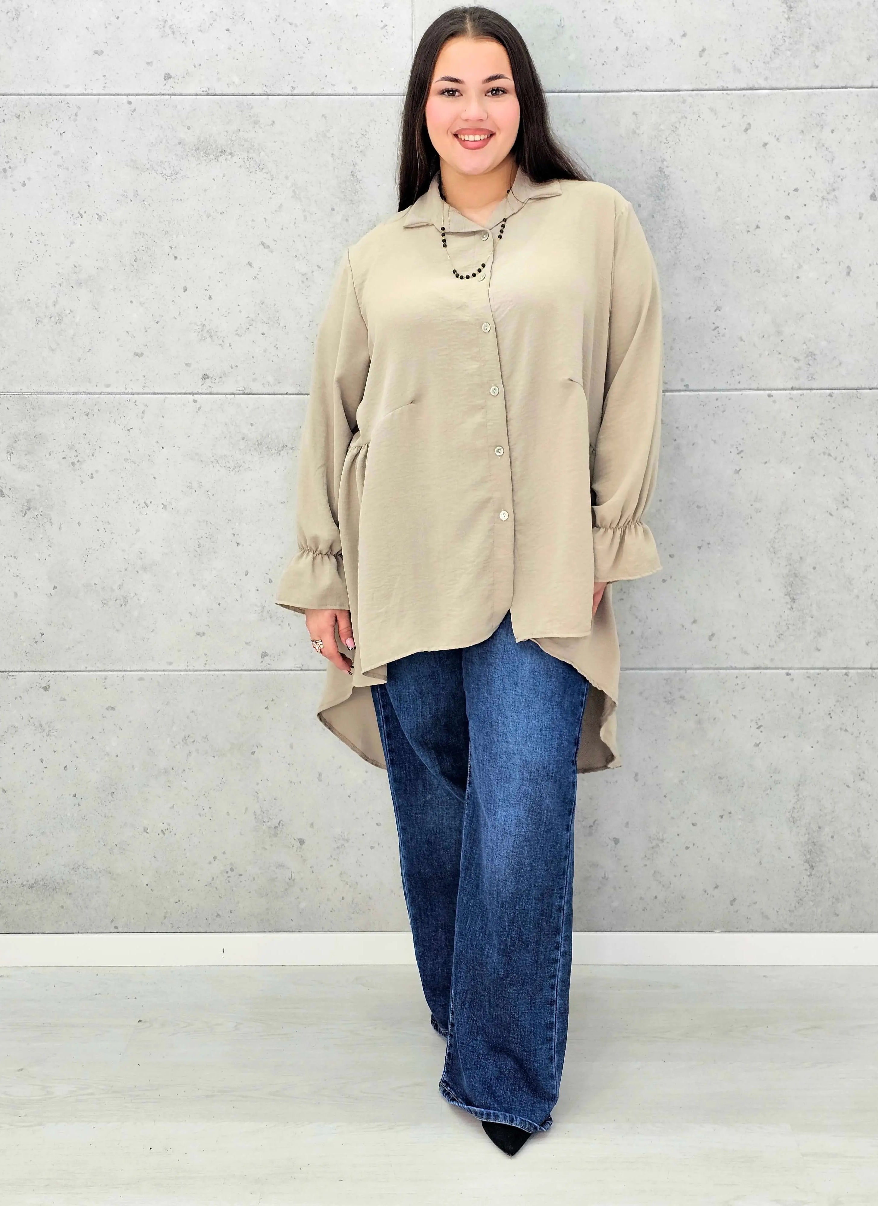 Bluzka plus size z dłuższym tyłem i eleganckim fasonem - Stylowa XL