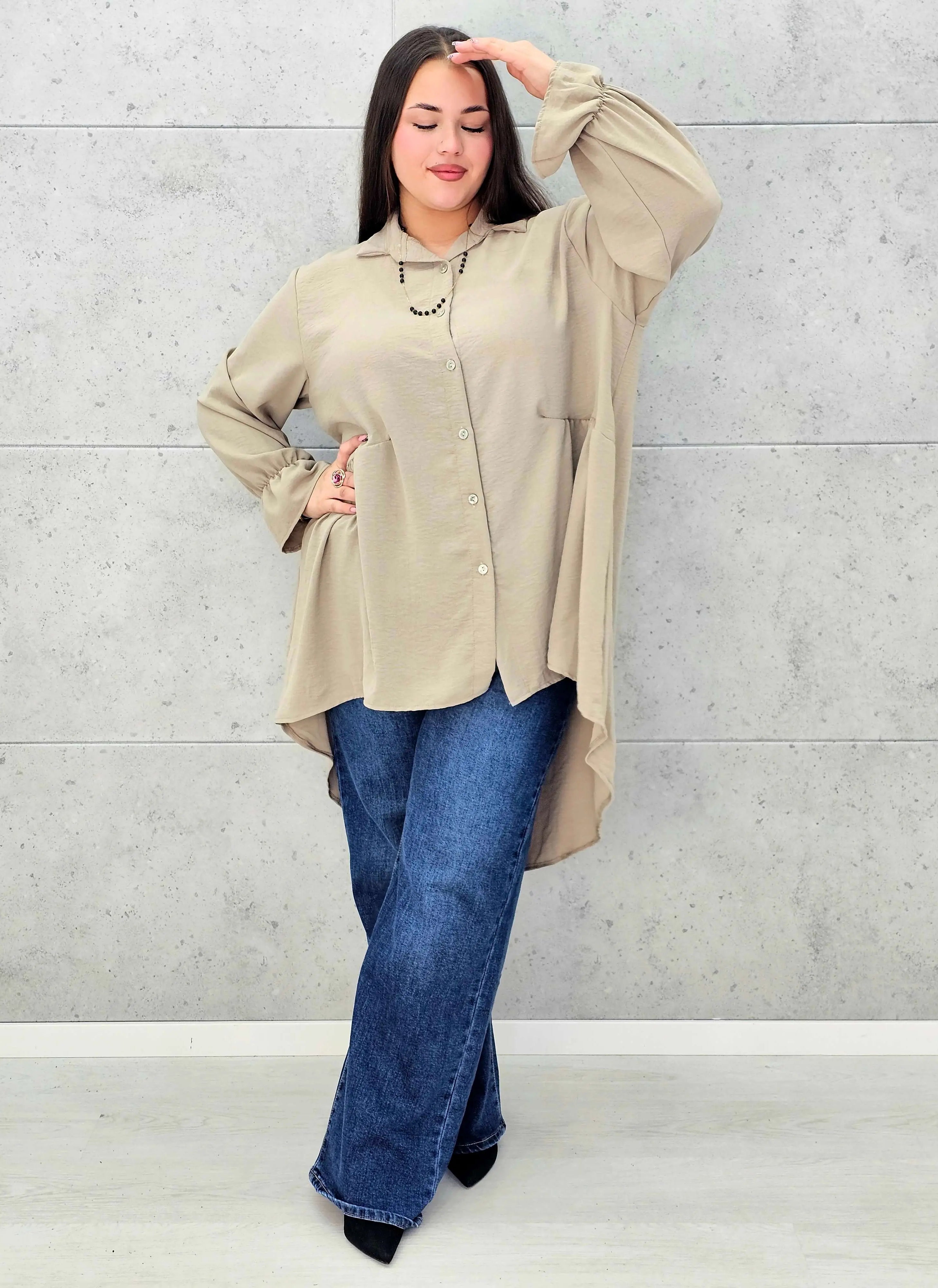 Bluzka plus size z dłuższym tyłem i eleganckim fasonem - Stylowa XL