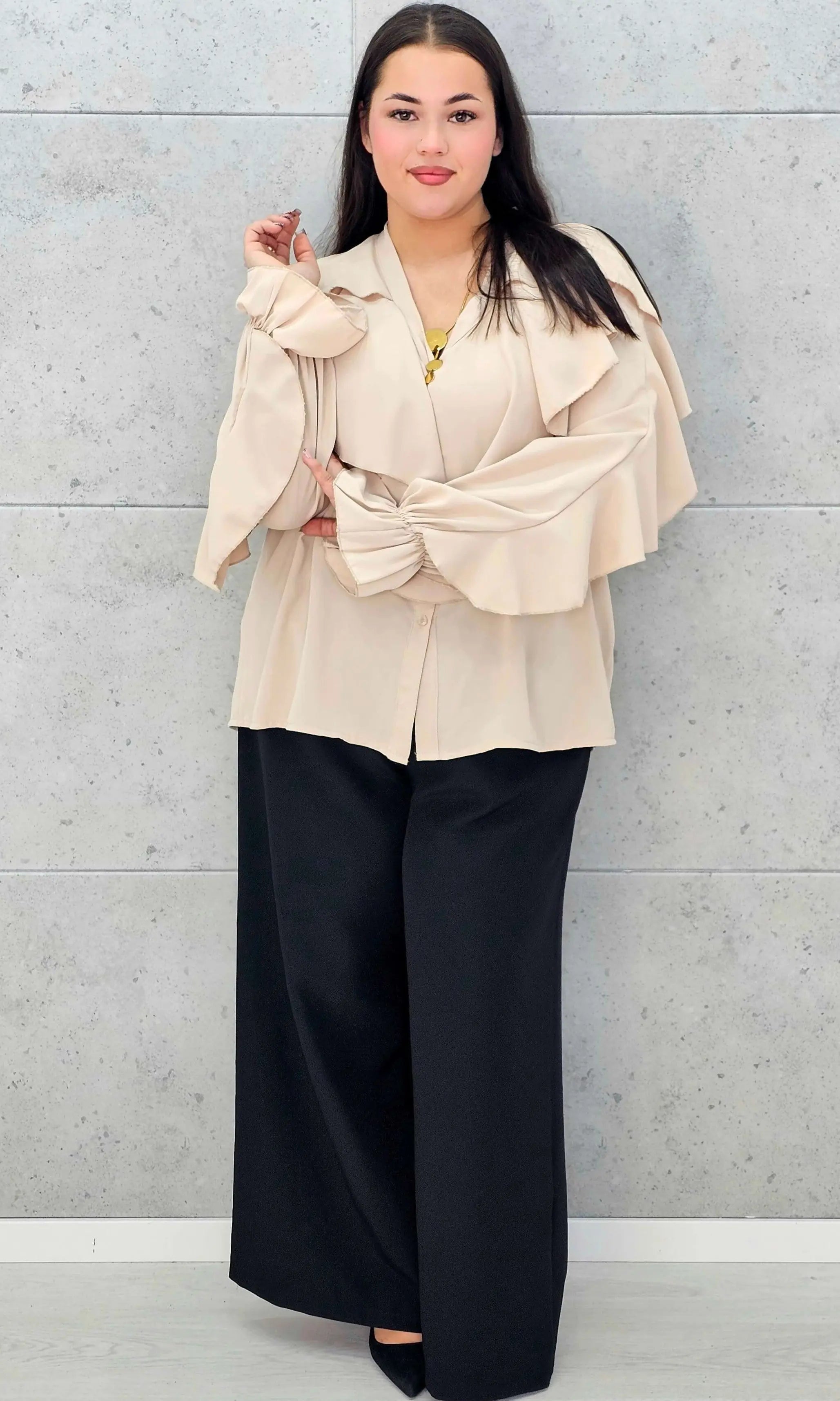 Bluzka plus size z falbanami – romantyczny szyk i wygoda w eleganckim stylu - Stylowa XL