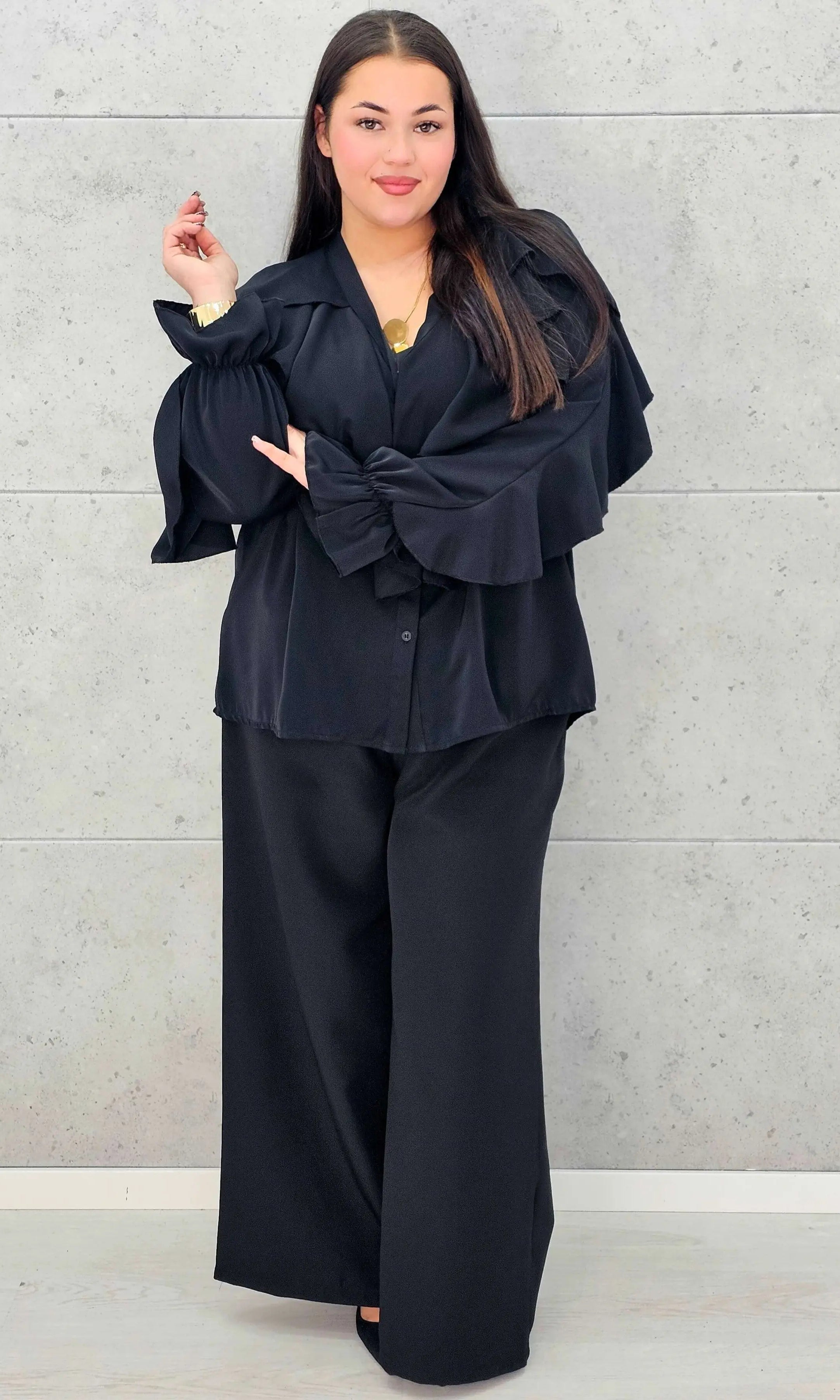 Bluzka plus size z falbanami – romantyczny szyk i wygoda w eleganckim stylu - Stylowa XL