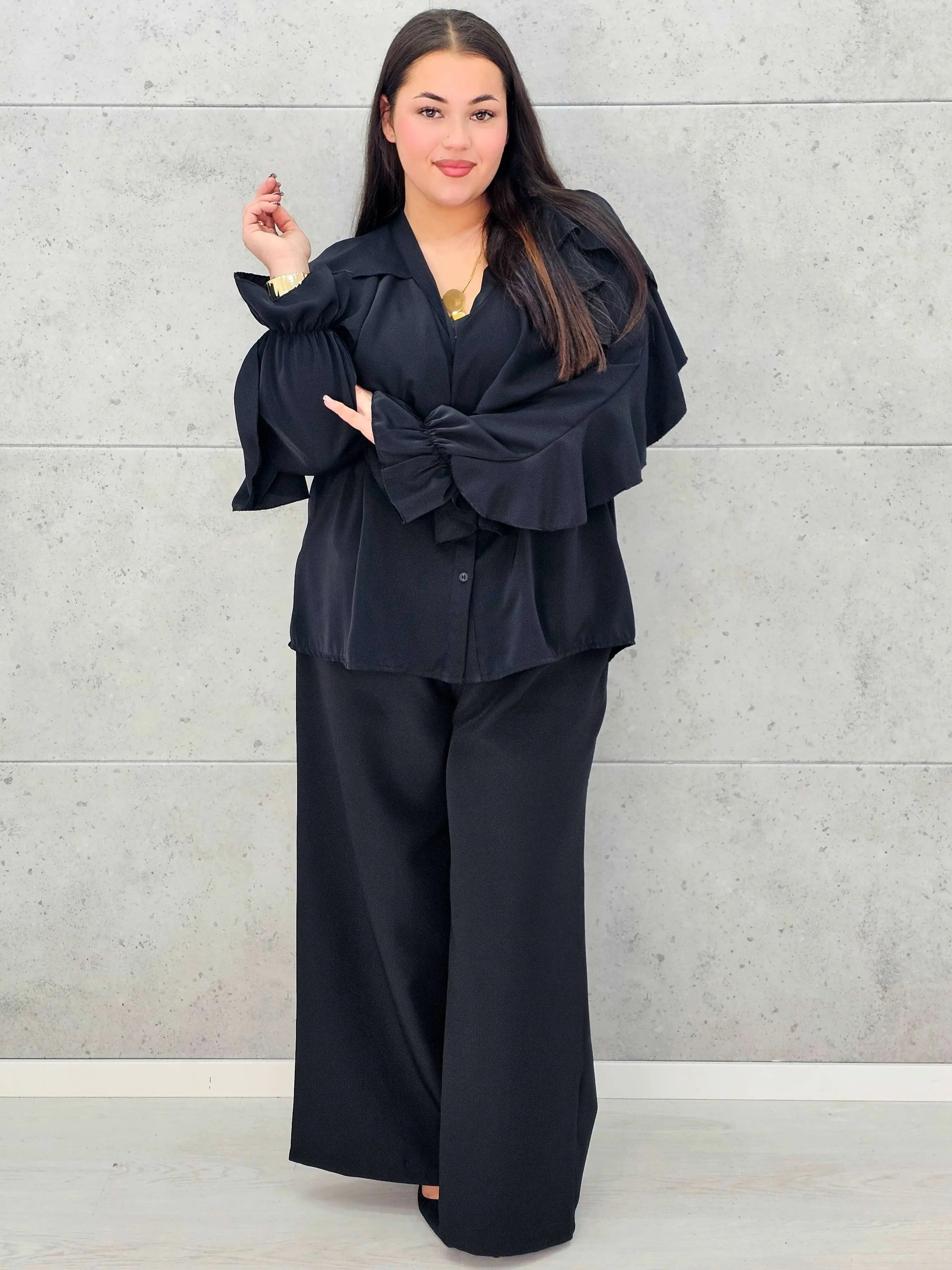 Bluzka plus size z falbanami – romantyczny szyk i wygoda w eleganckim stylu - Stylowa XL