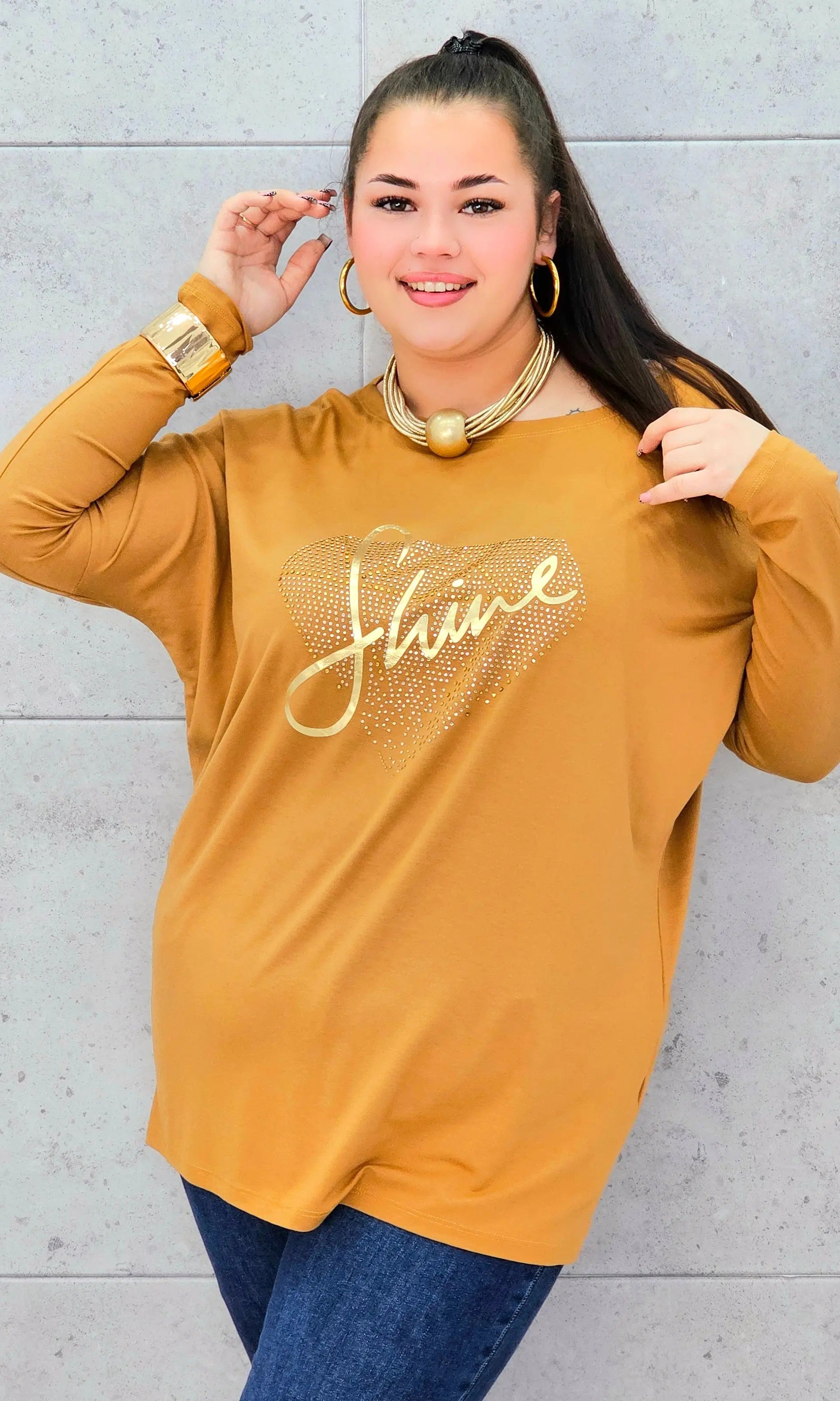 Bluzka plus size z nadrukiem SHINE – modny i wygodny look XXL Stylowa XL