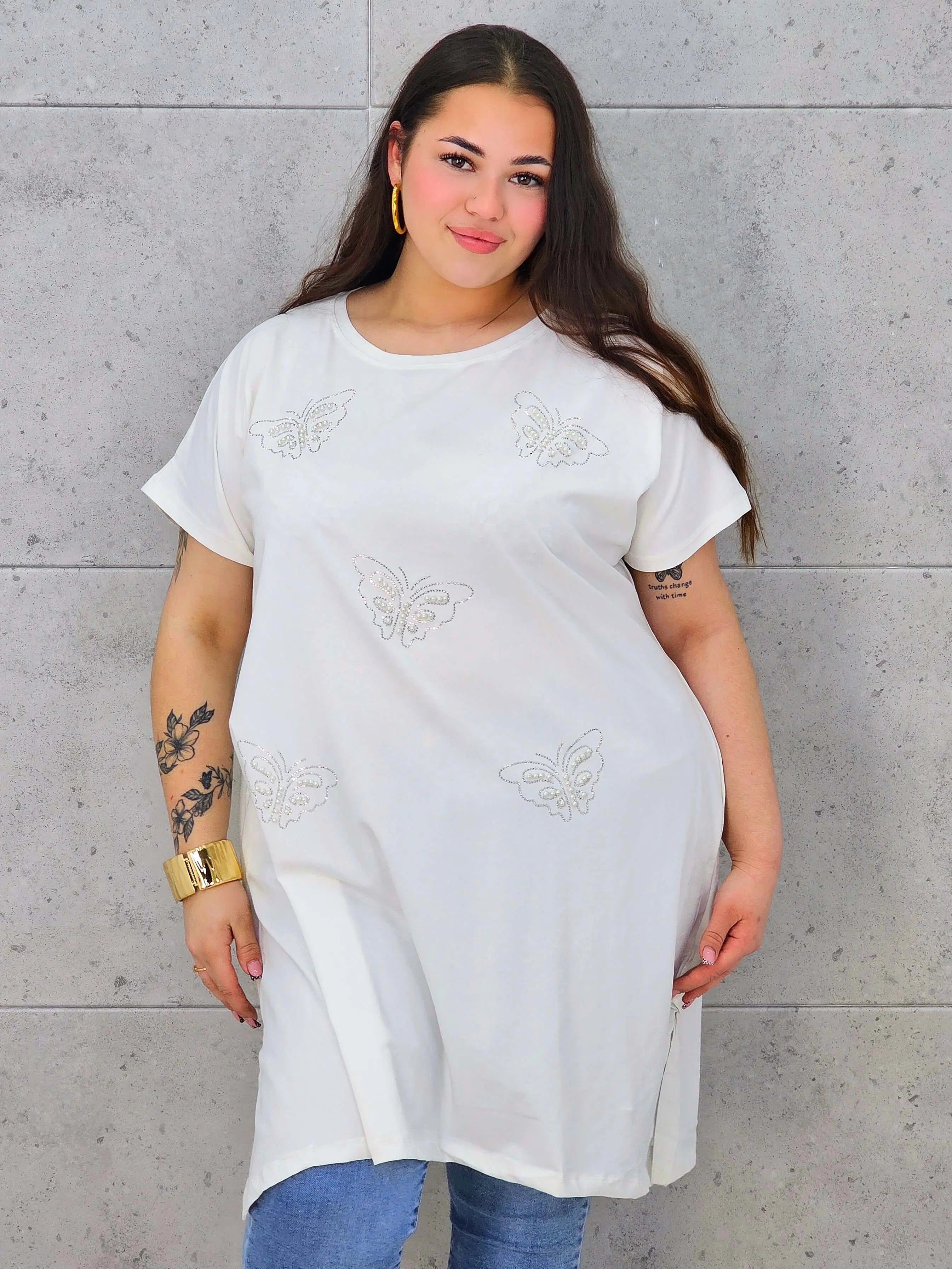 Bluzka plus size z połyskującymi motylami – elegancja i wygoda w jednym Stylowa XL