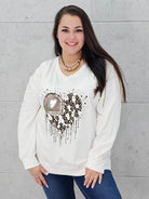 Bluzka plus size z sercem i cekinami – modny look XXL Stylowa XL