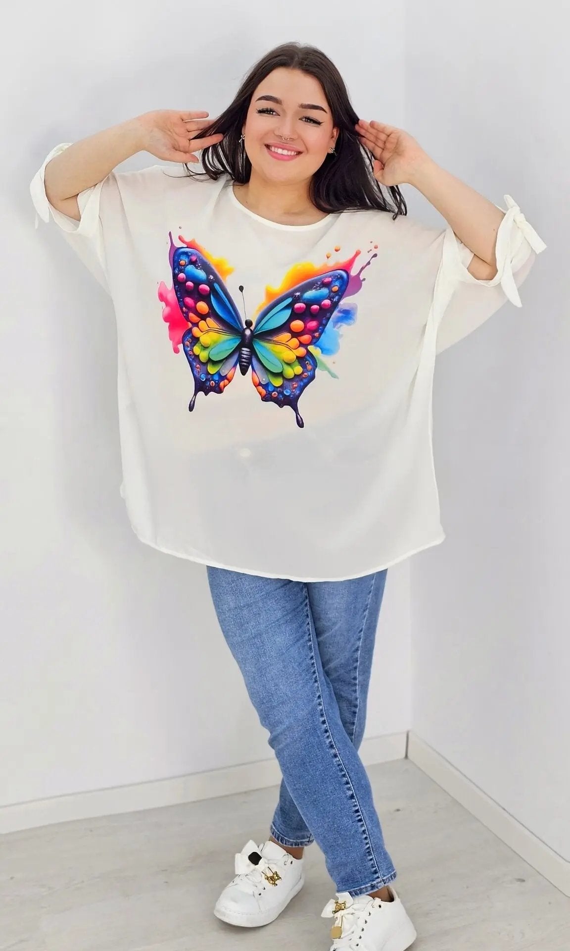 Bluzka z aplikacją na przodzie oraz wiązanym rękawem - kolorowy motyl Stylowa XL