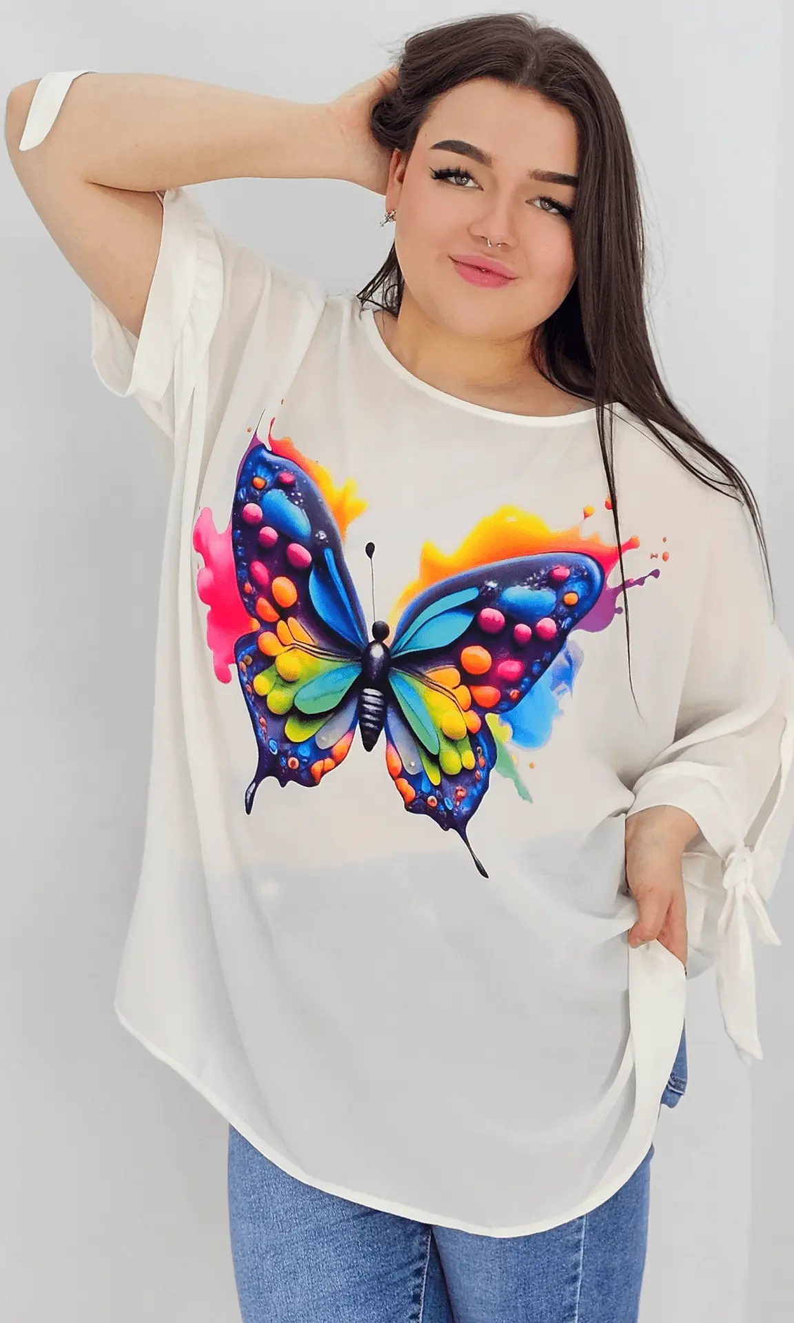 Bluzka z aplikacją na przodzie oraz wiązanym rękawem - kolorowy motyl Stylowa XL