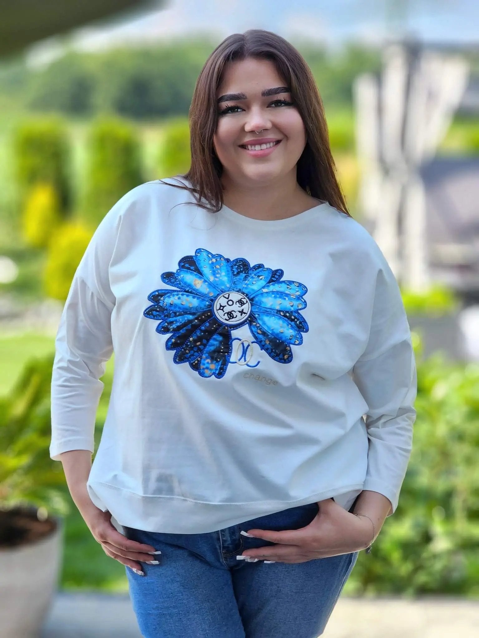 Bluzka z kwiatem Stylowa XL