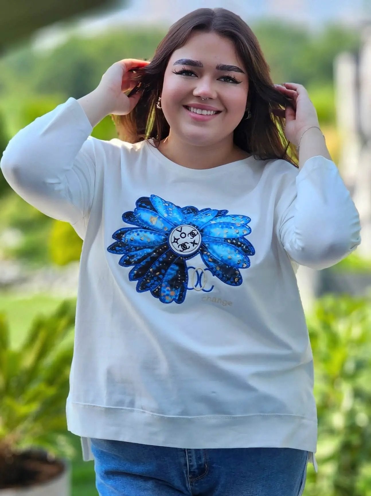 Bluzka z kwiatem Stylowa XL