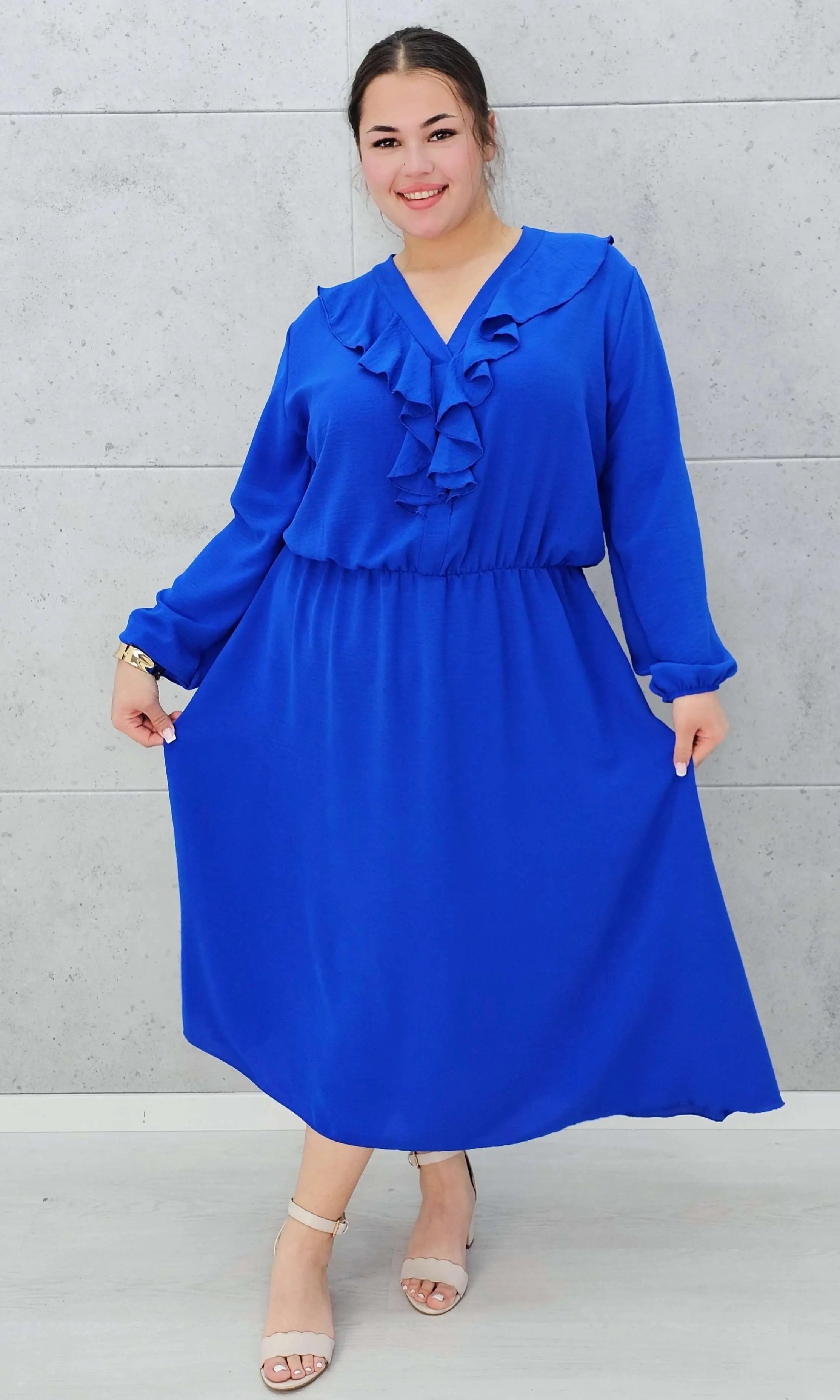 Elegancka sukienka z żabotem w kolorach Stylowa XL