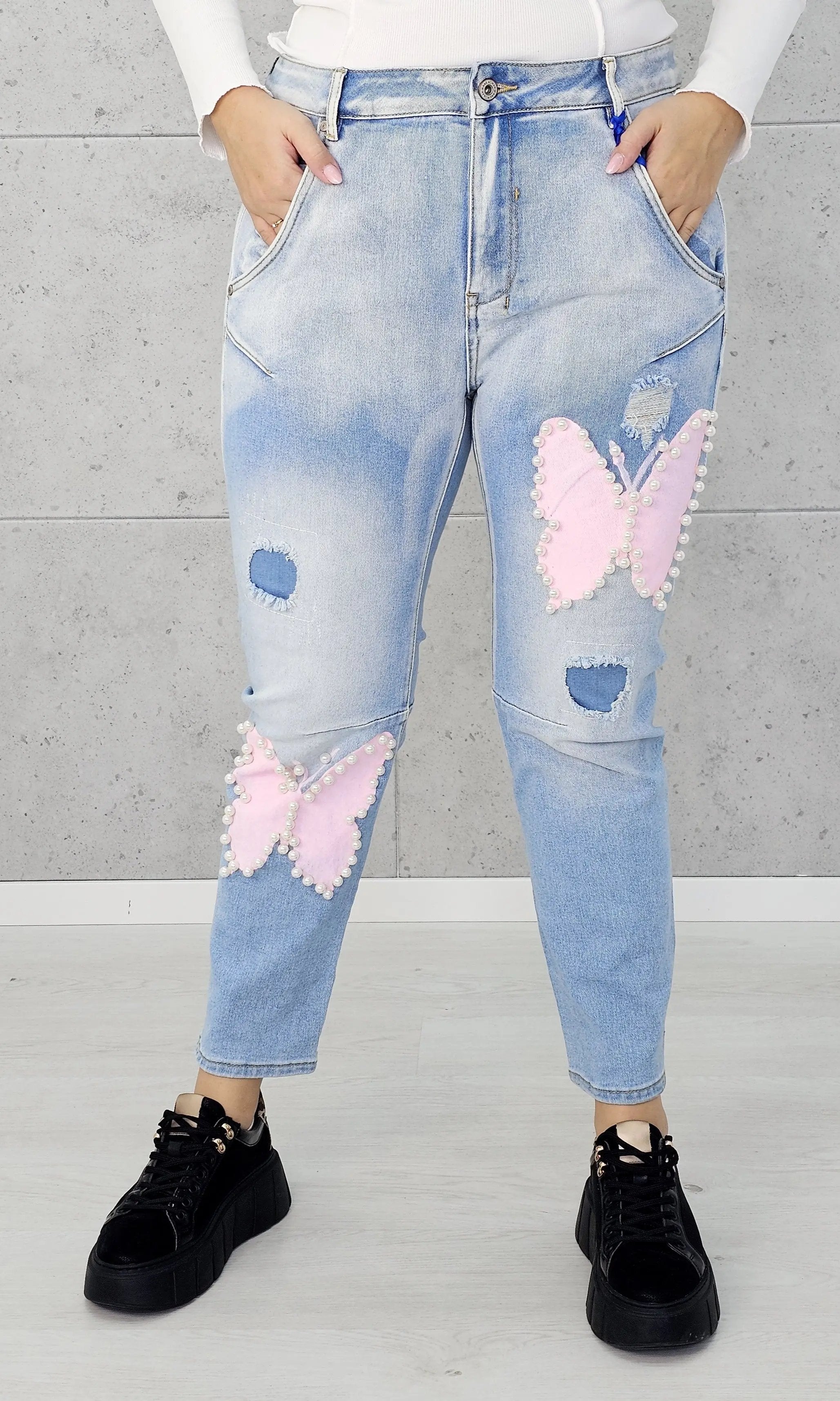 Jeansy z różowymi motylami i perełkami Stylowa XL