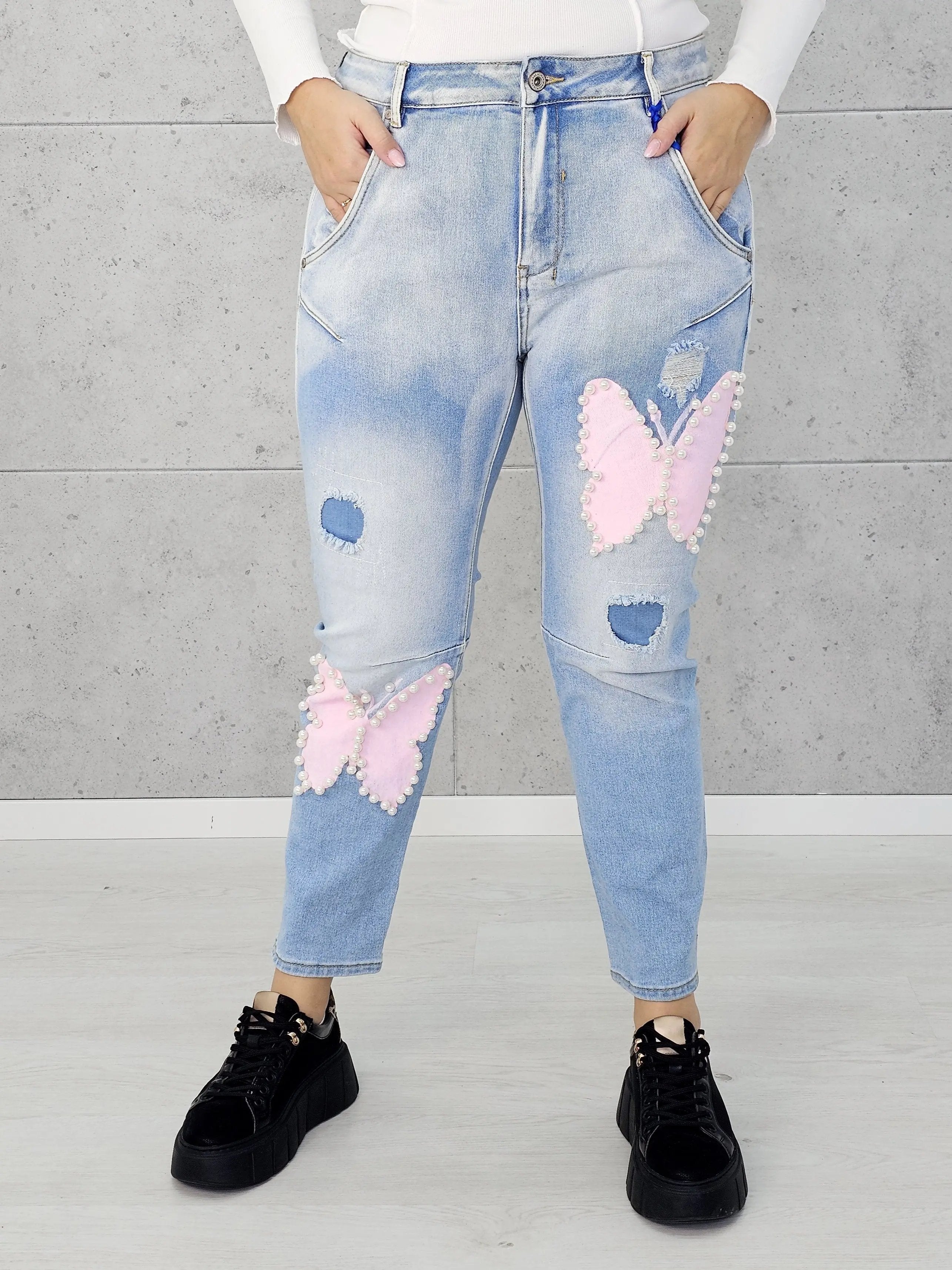 Jeansy z różowymi motylami i perełkami Stylowa XL