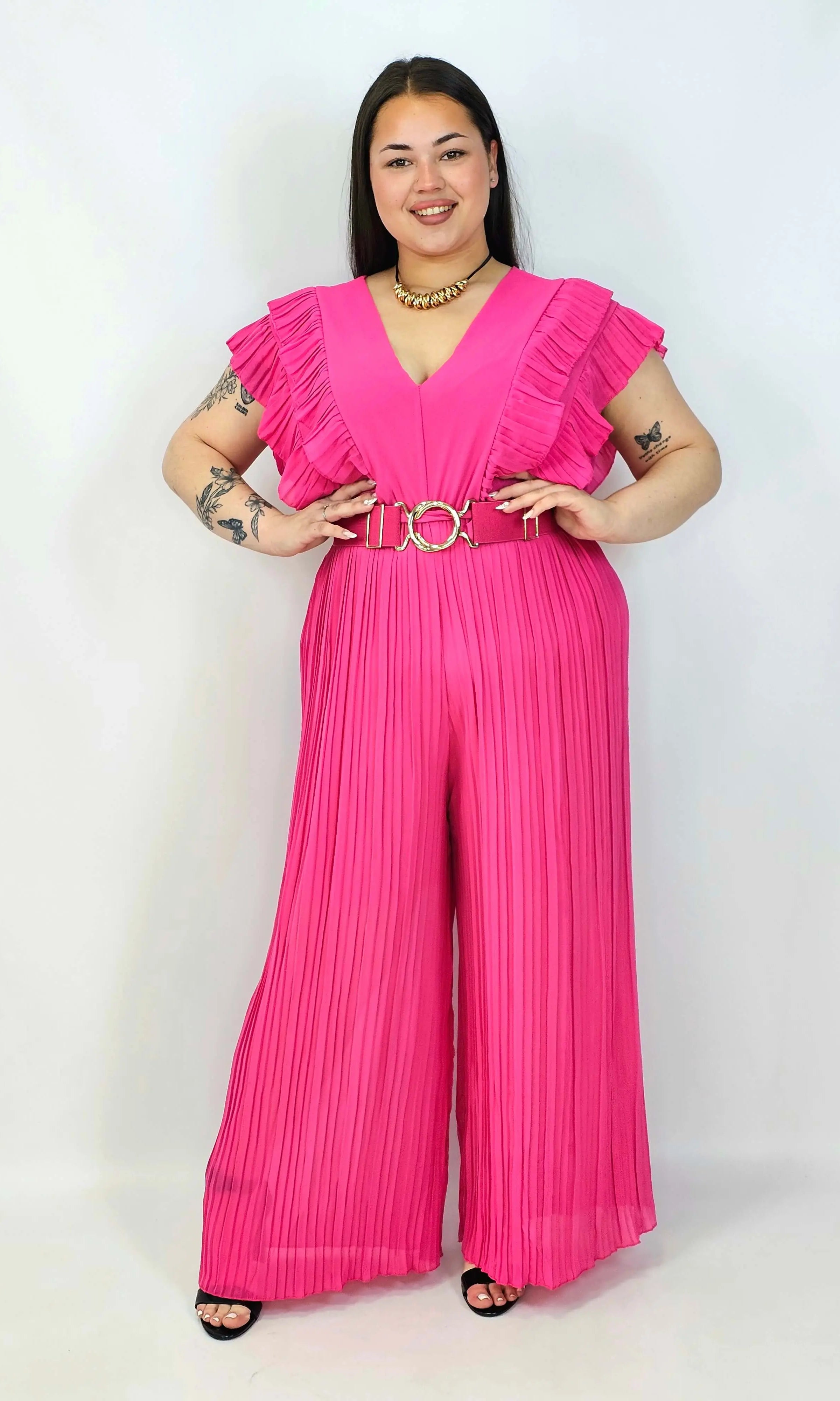 Kombinezon plus size VIP z plisowanymi nogawkami i efektownym dekoltem Stylowa XL