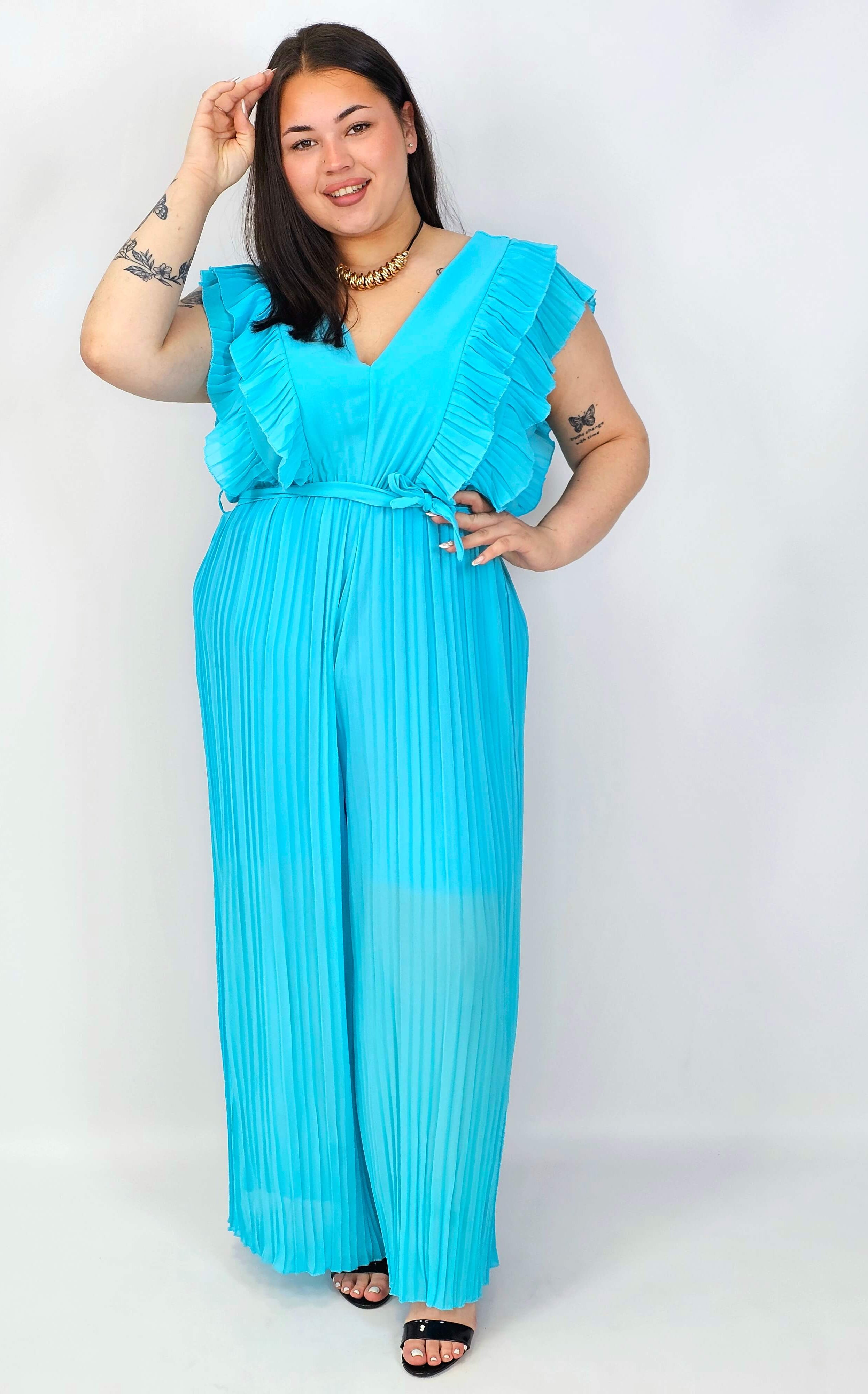 Kombinezon plus size VIP z plisowanymi nogawkami i efektownym dekoltem Stylowa XL