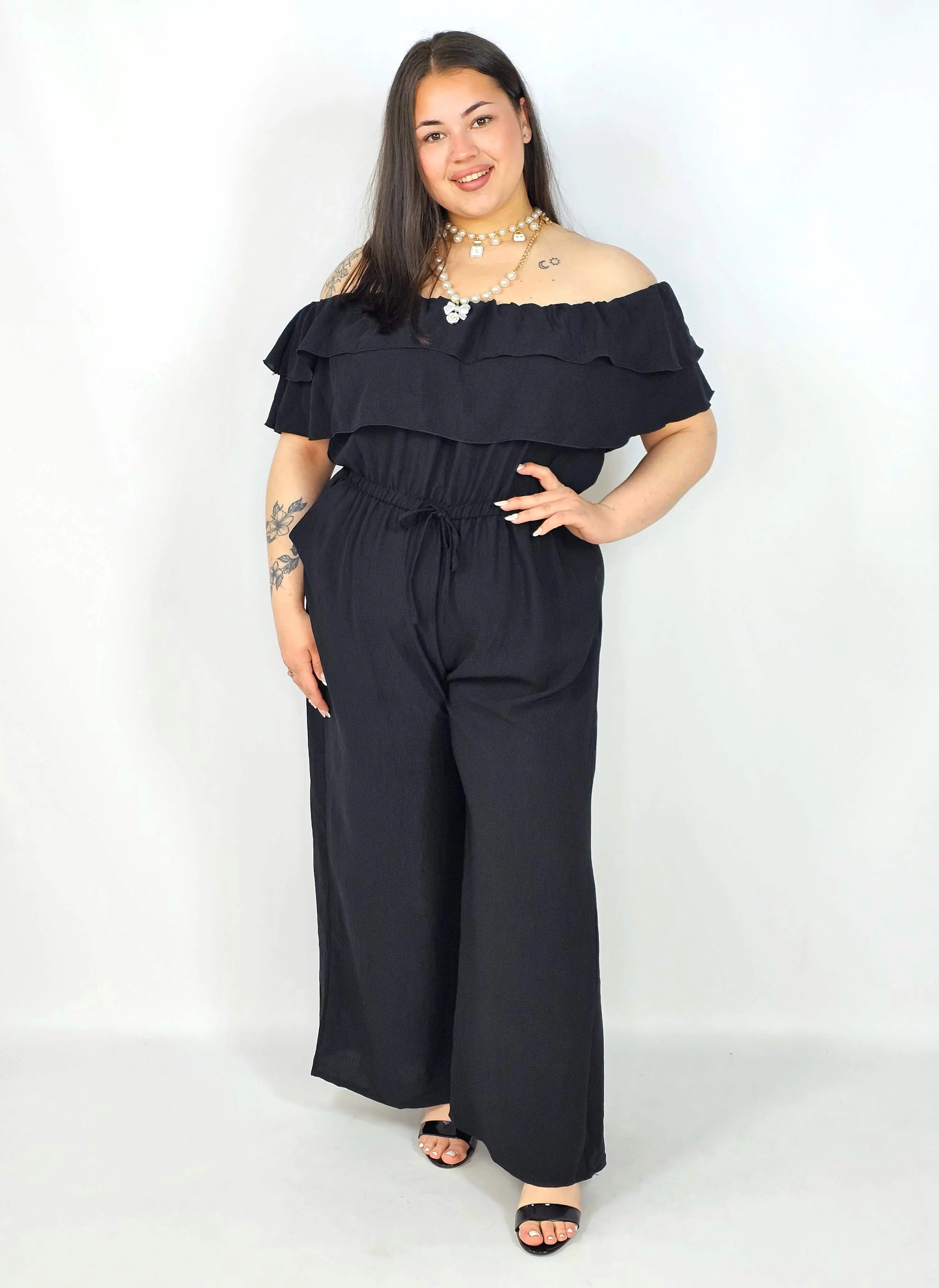 Kombinezon plus size –elegancki kombinezon z odkrytymi ramionami i szerokimi nogawkami Stylowa XL