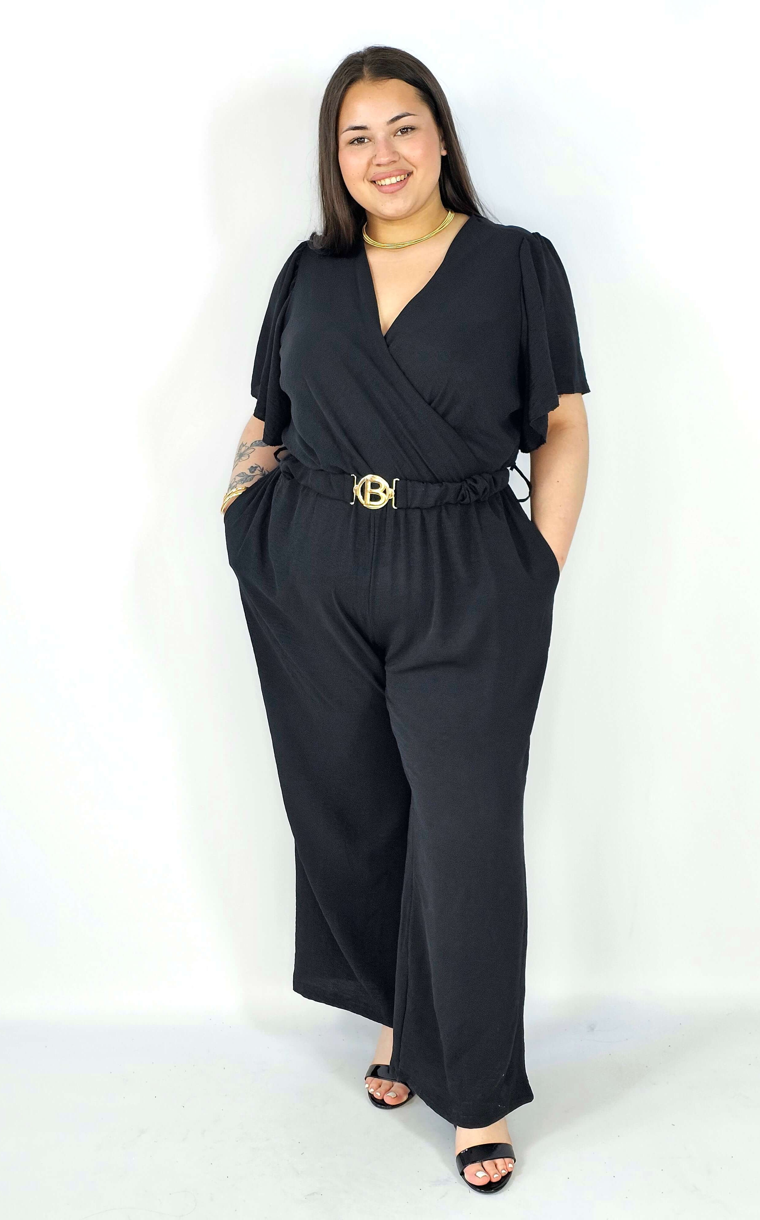 Kombinezon plus size z kopertowym dekoltem i paskiem – wygoda i styl XXL Stylowa XL