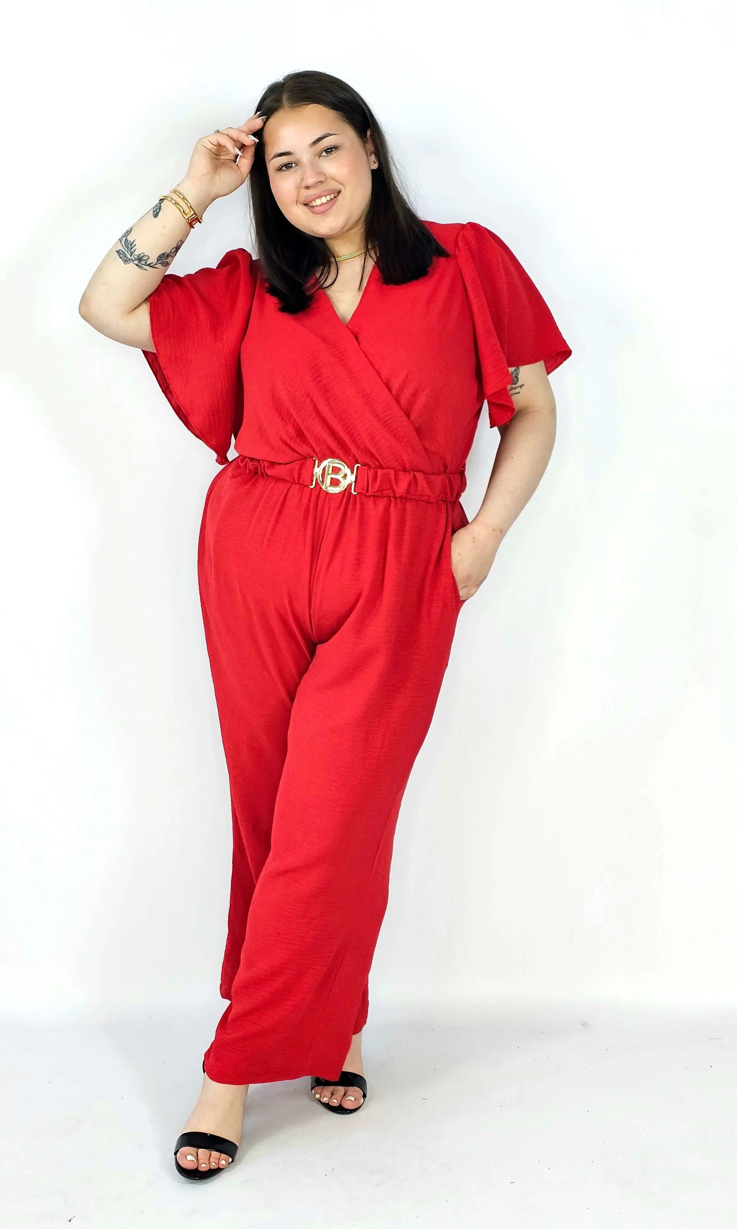 Kombinezon plus size z kopertowym dekoltem i paskiem – wygoda i styl XXL Stylowa XL
