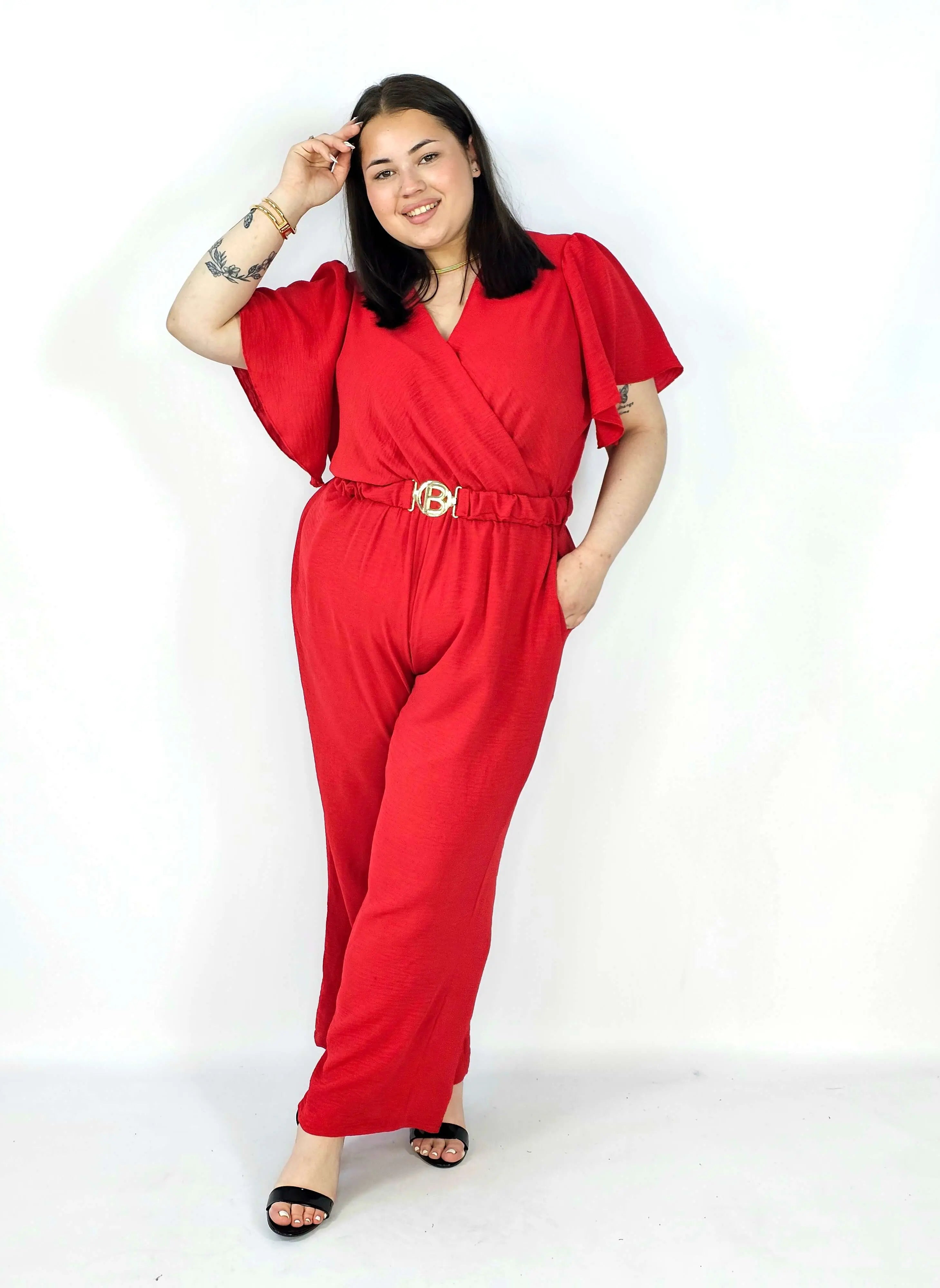 Kombinezon plus size z kopertowym dekoltem i paskiem – wygoda i styl XXL Stylowa XL