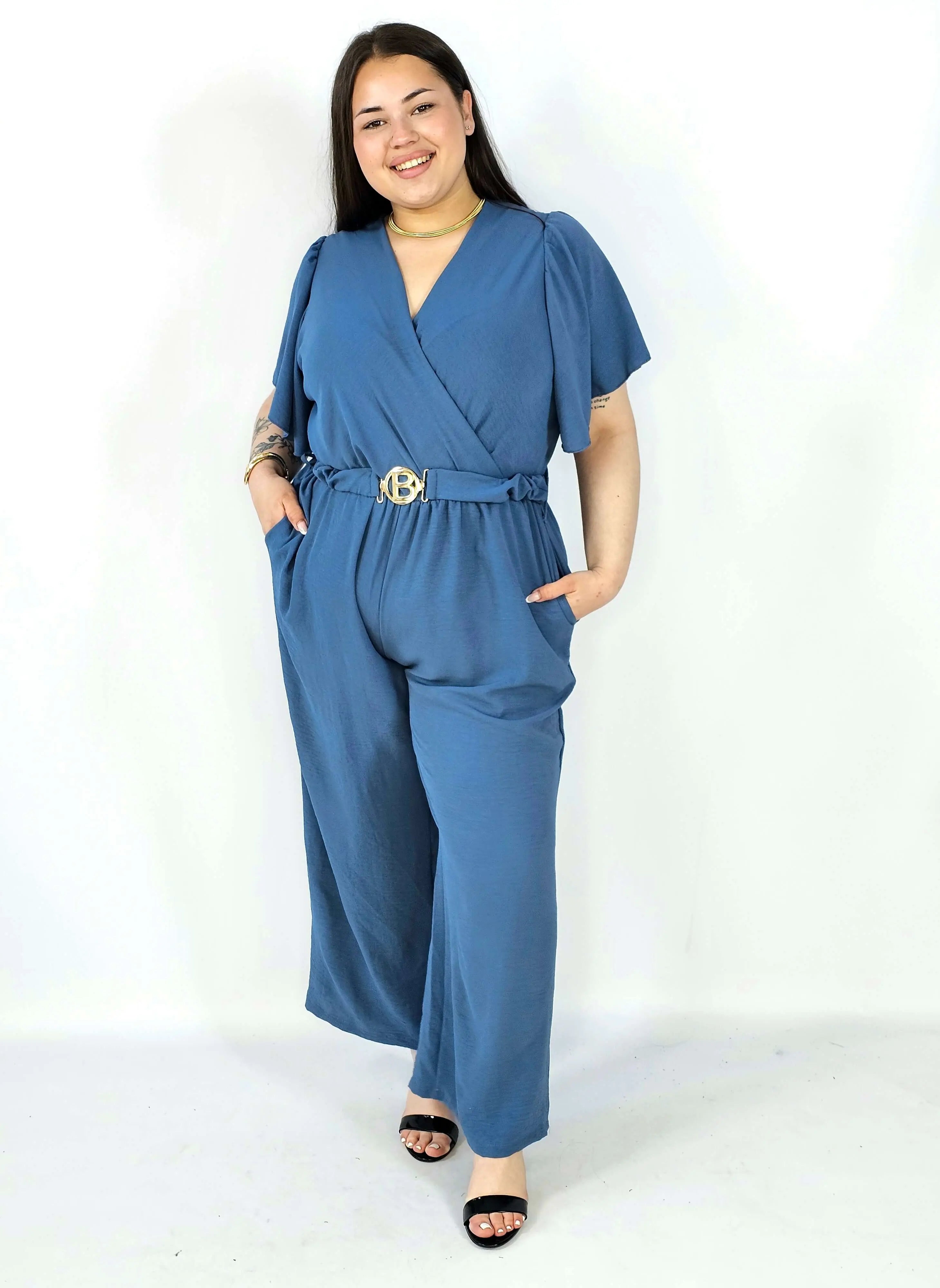 Kombinezon plus size z kopertowym dekoltem i paskiem – wygoda i styl XXL Stylowa XL