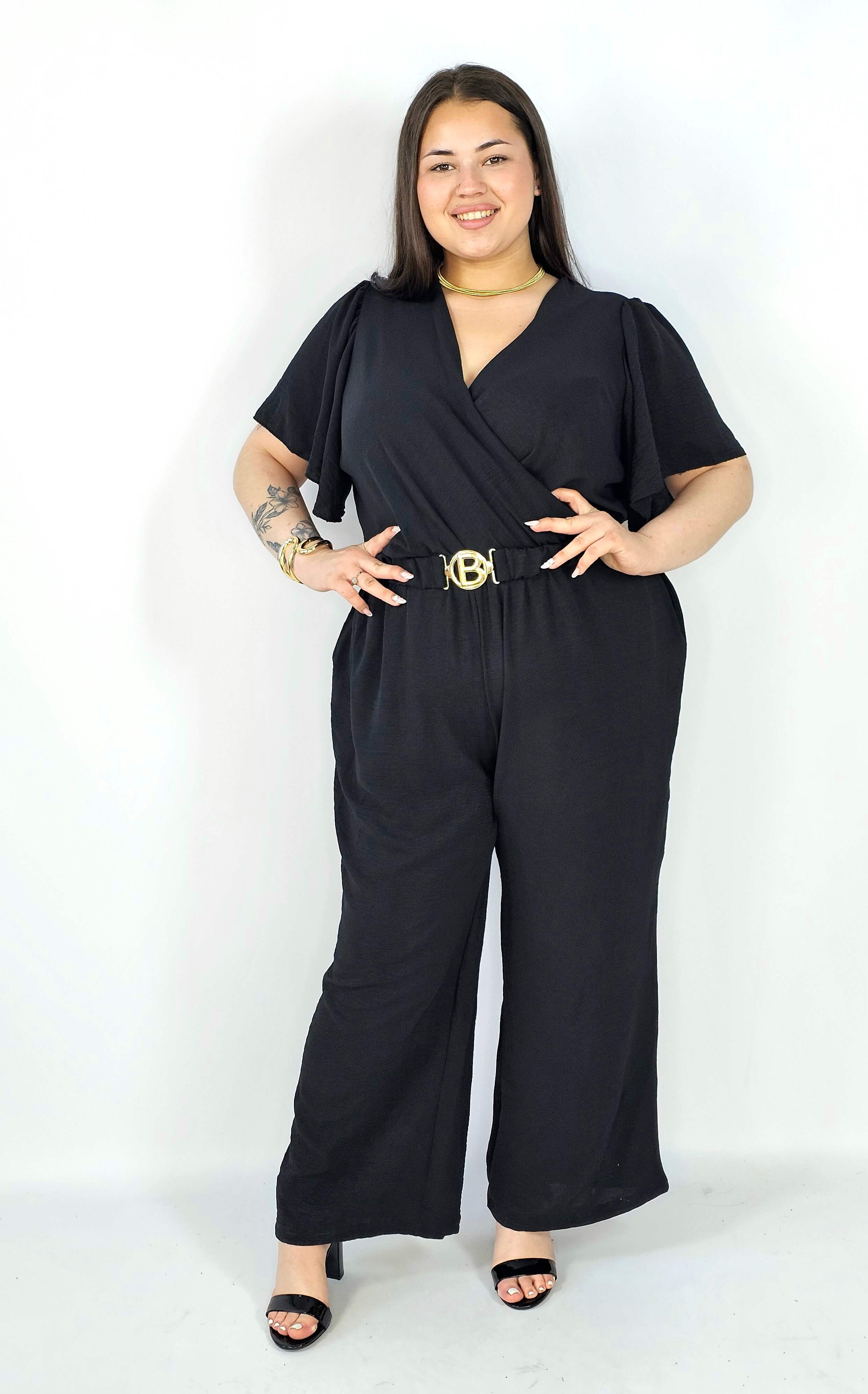 Kombinezon plus size z kopertowym dekoltem i paskiem – wygoda i styl XXL Stylowa XL