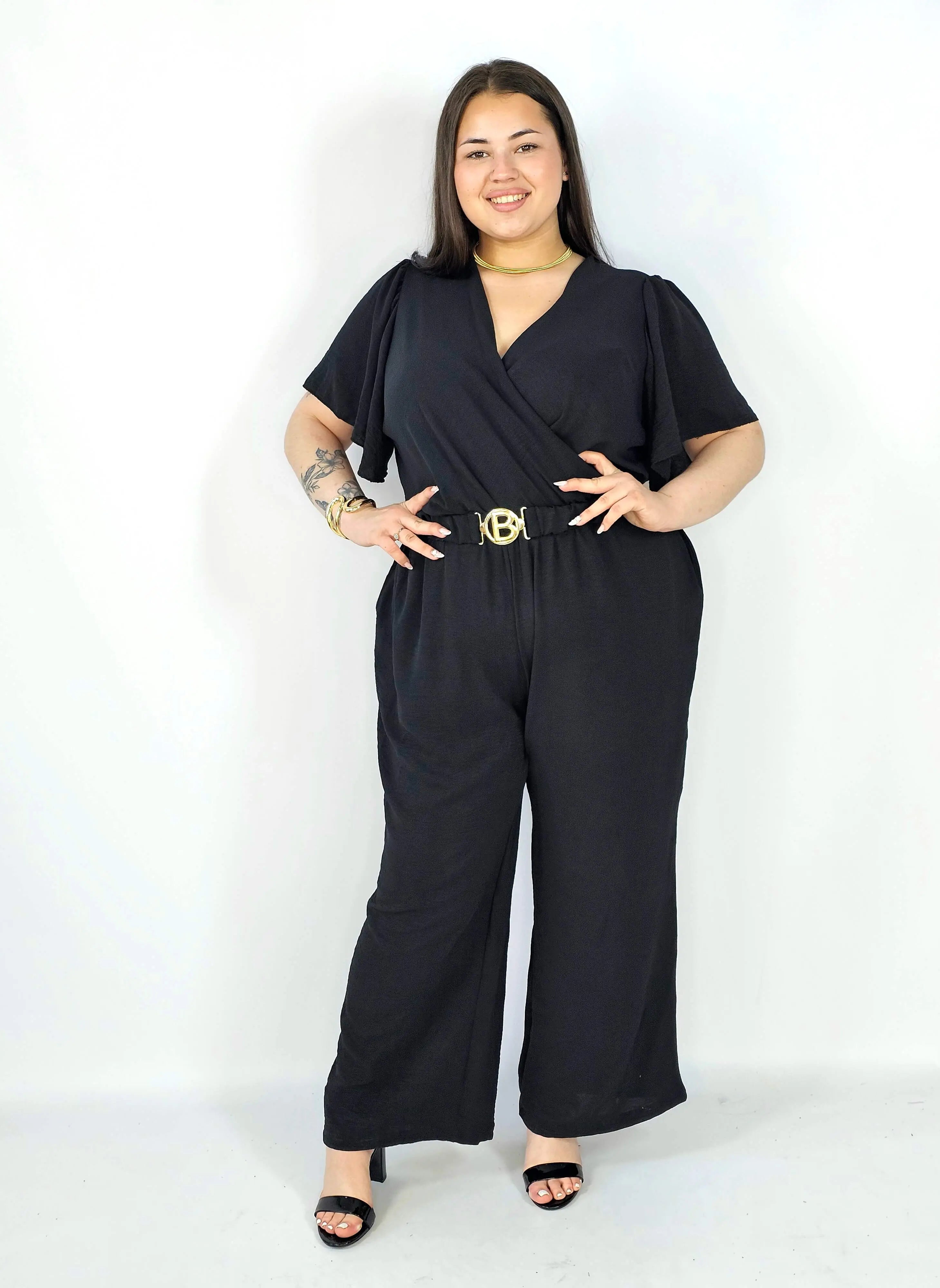 Kombinezon plus size z kopertowym dekoltem i paskiem – wygoda i styl XXL Stylowa XL
