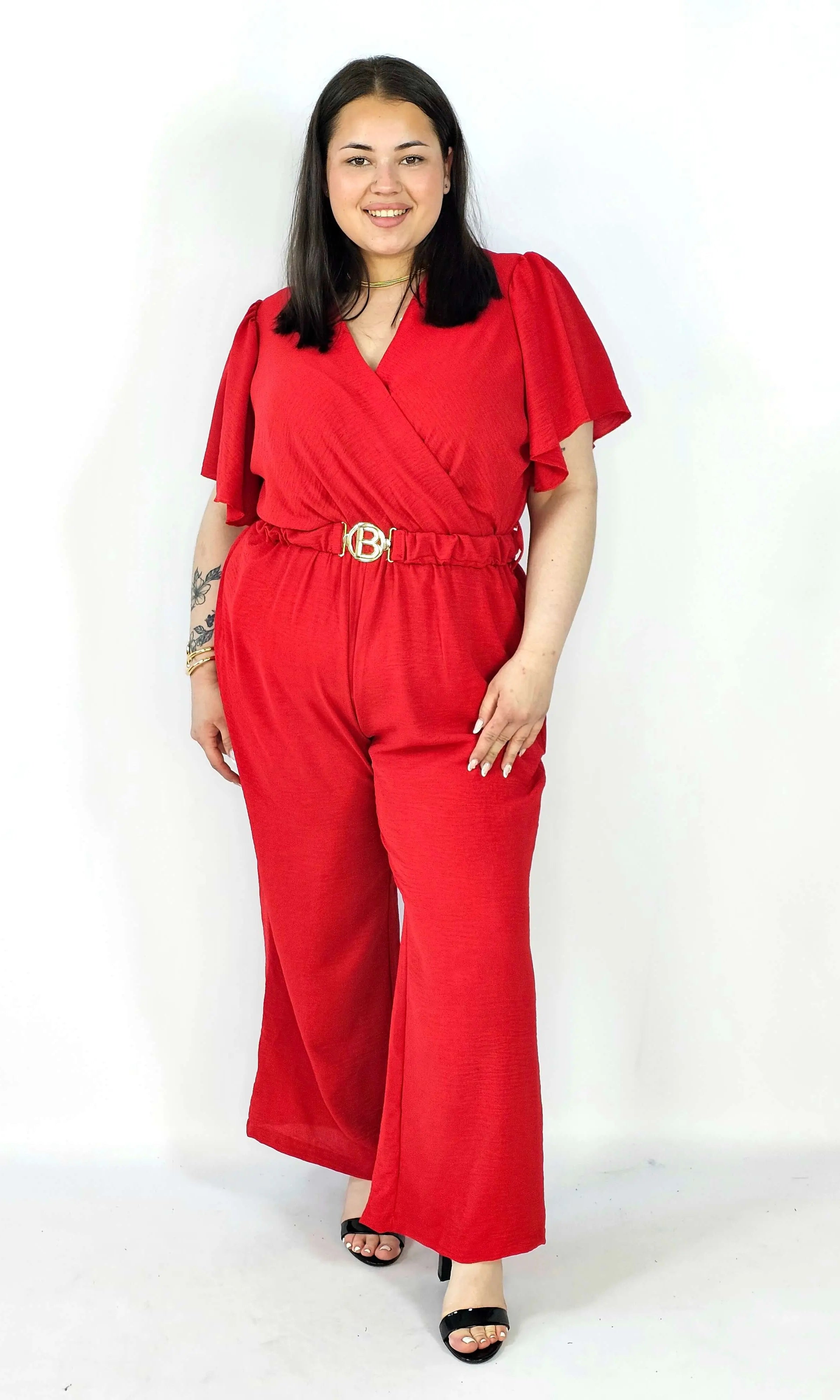 Kombinezon plus size z kopertowym dekoltem i paskiem – wygoda i styl XXL Stylowa XL