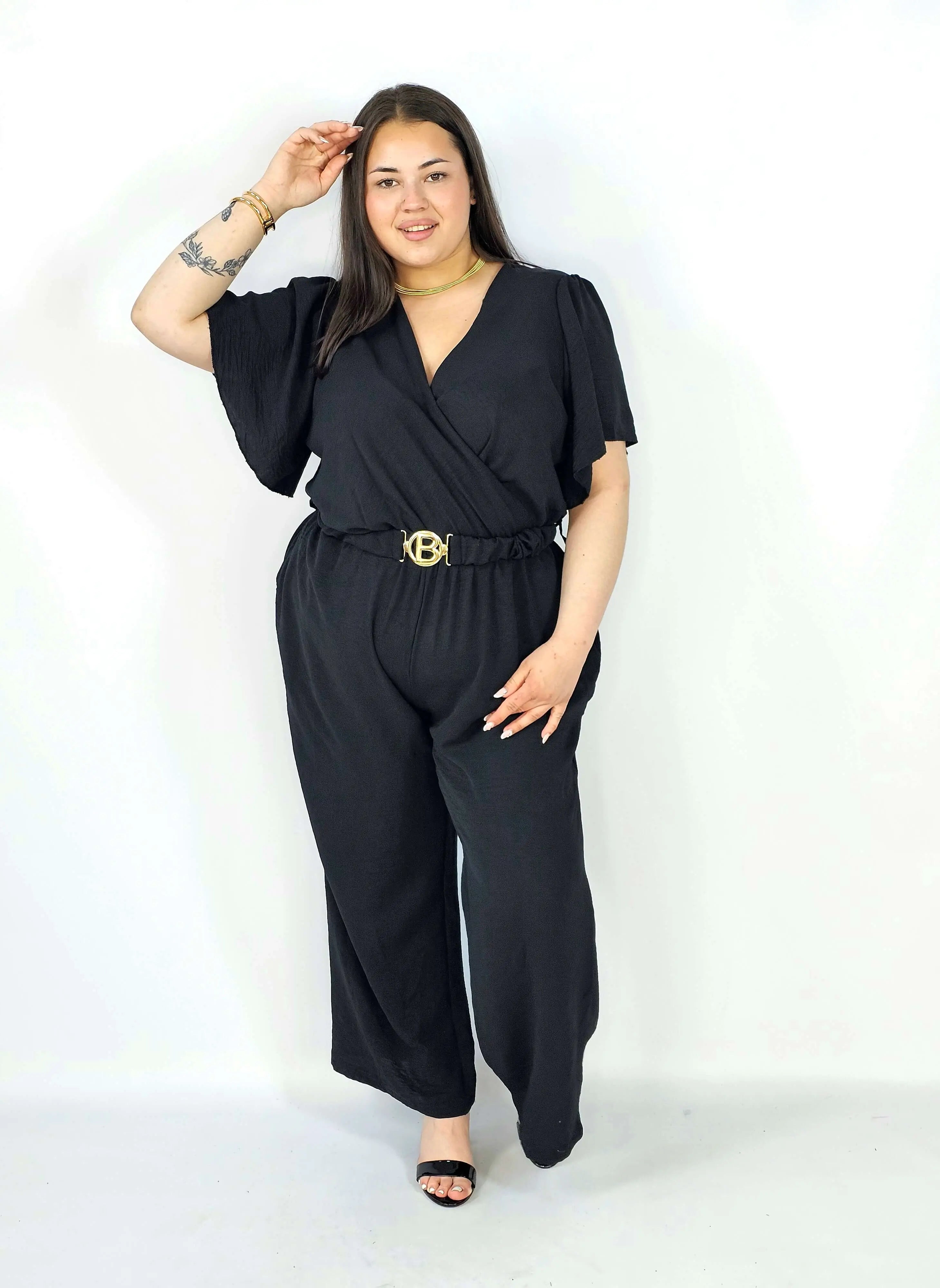 Kombinezon plus size z kopertowym dekoltem i paskiem – wygoda i styl XXL Stylowa XL
